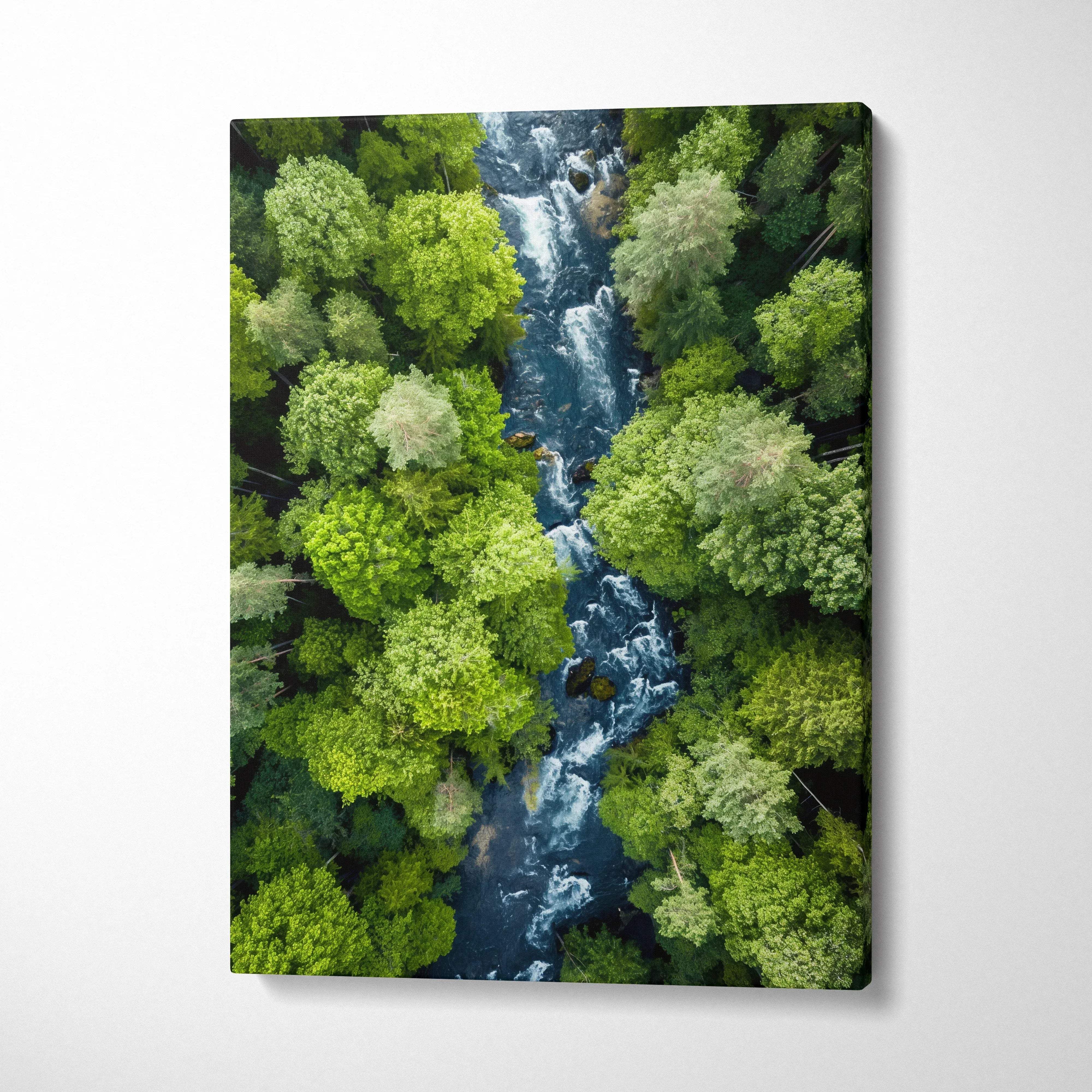 Vertical canvas wall art featuring a serene river flowing through dense green forest trees, perfect for nature-inspired.