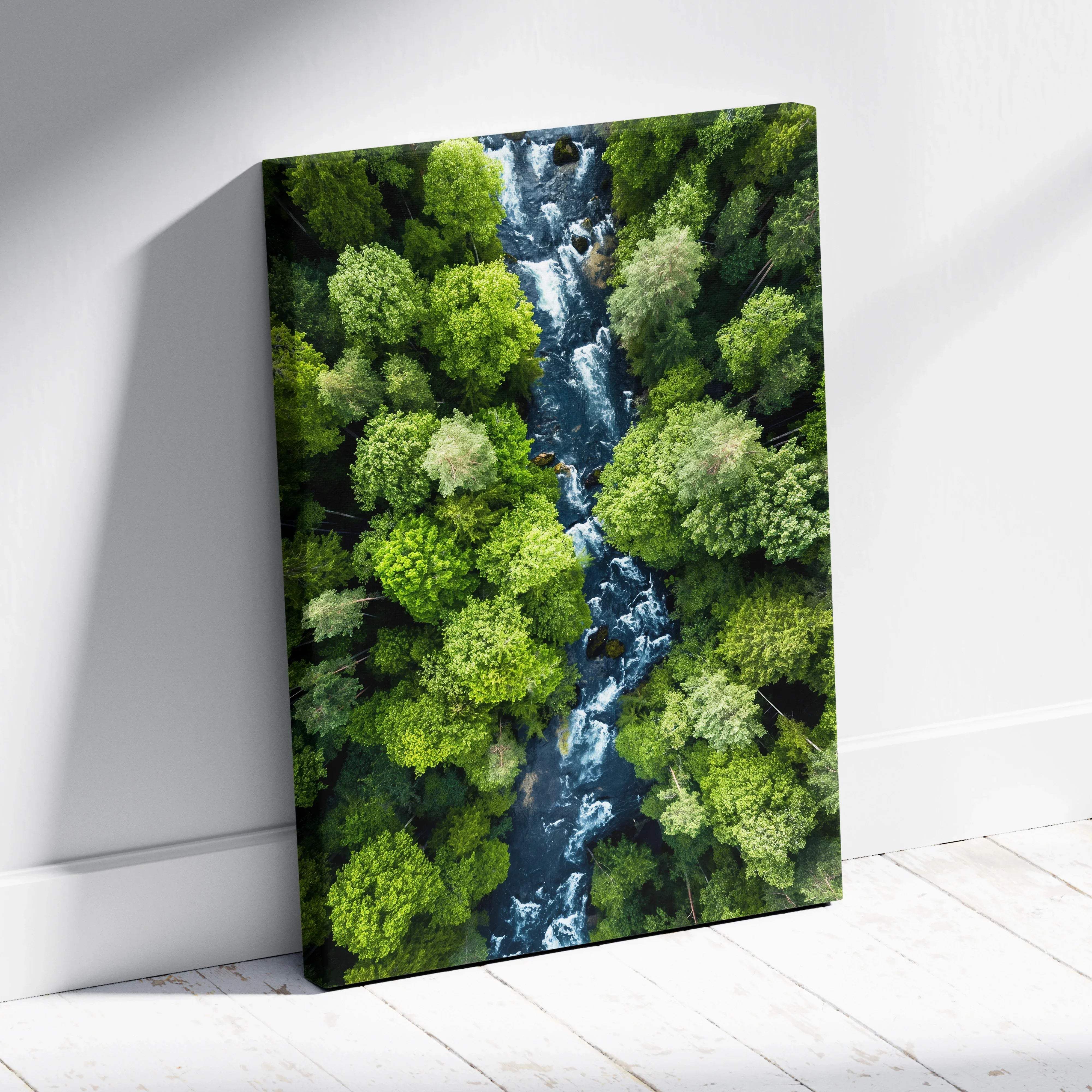 Aerial forest landscape canvas wall art with a winding blue river through vibrant green foliage for home decor