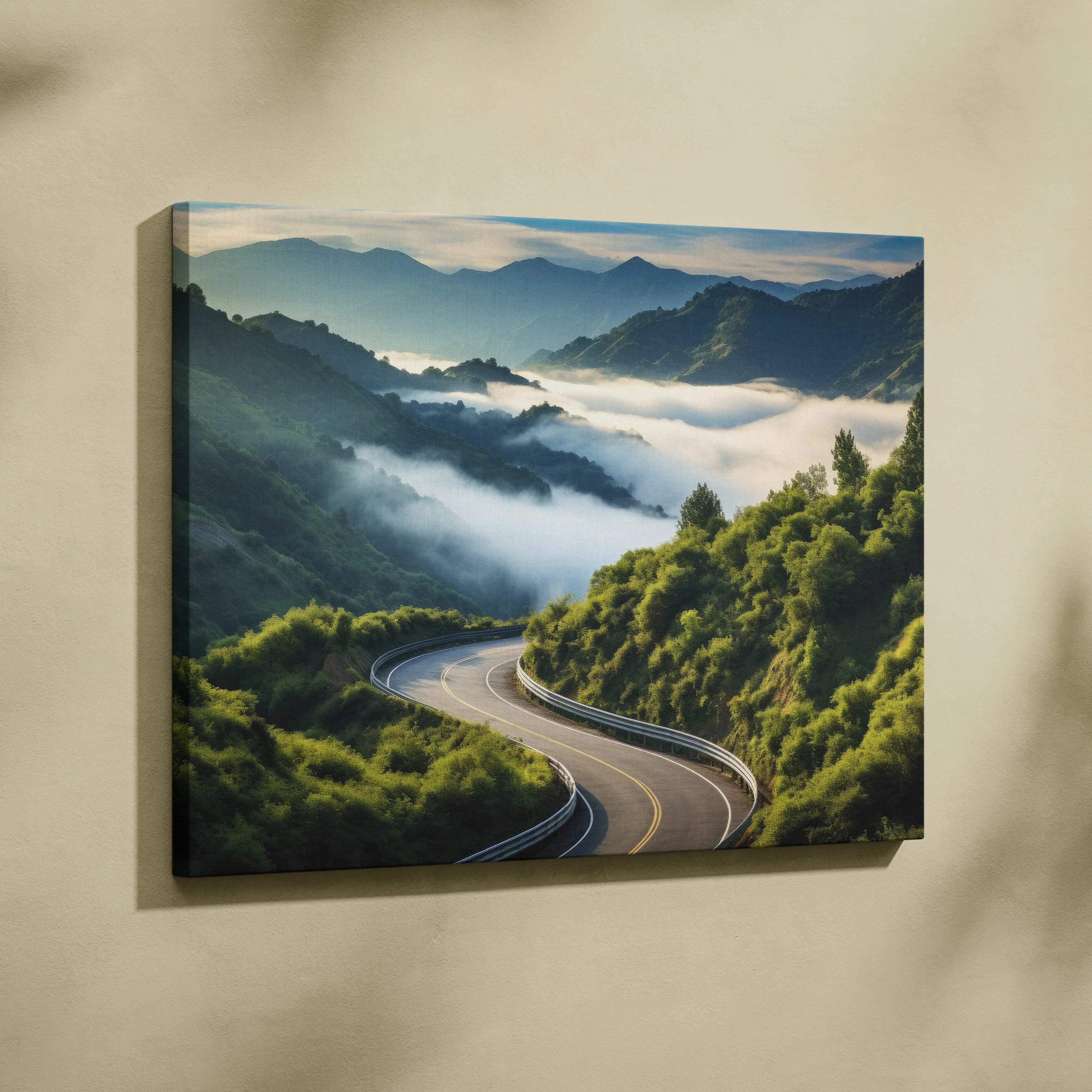 Canvas print of winding mountain road surrounded by lush green hills and misty valleys for calming wall art