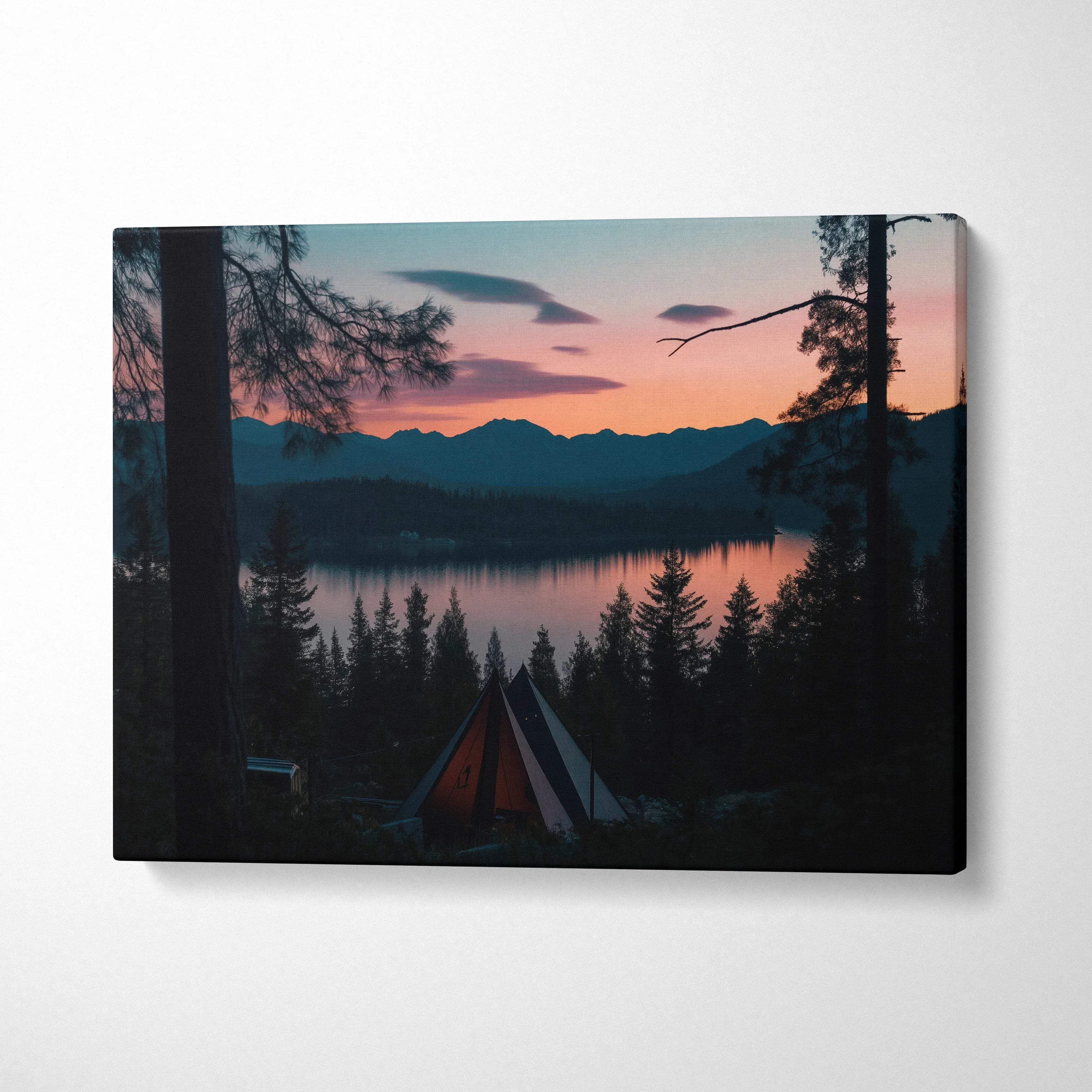 Canvas wall art featuring a vibrant forest sunset with silhouette trees and serene lake decor.