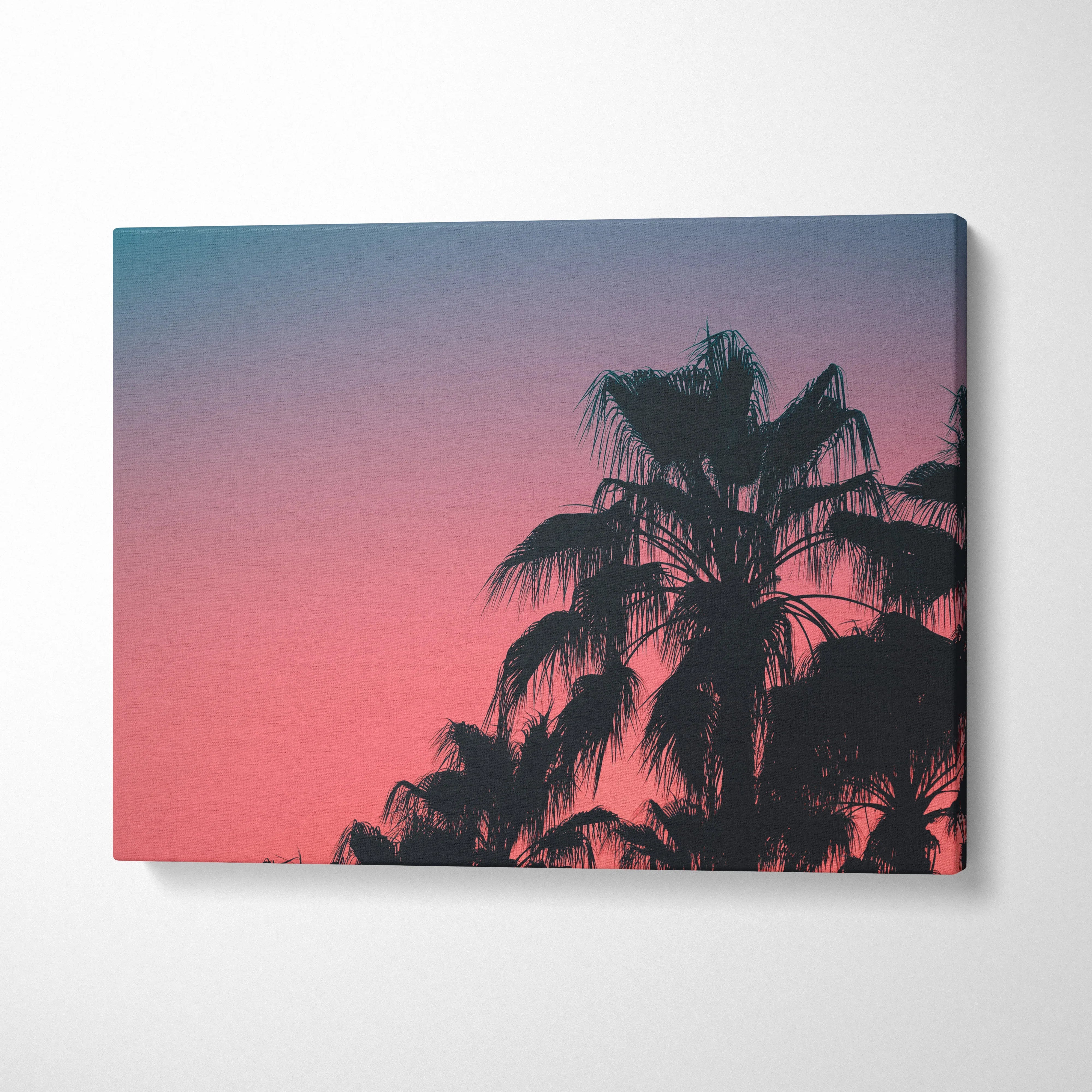 Tropical palm silhouette against pink and purple sunset sky canvas wall art decor.