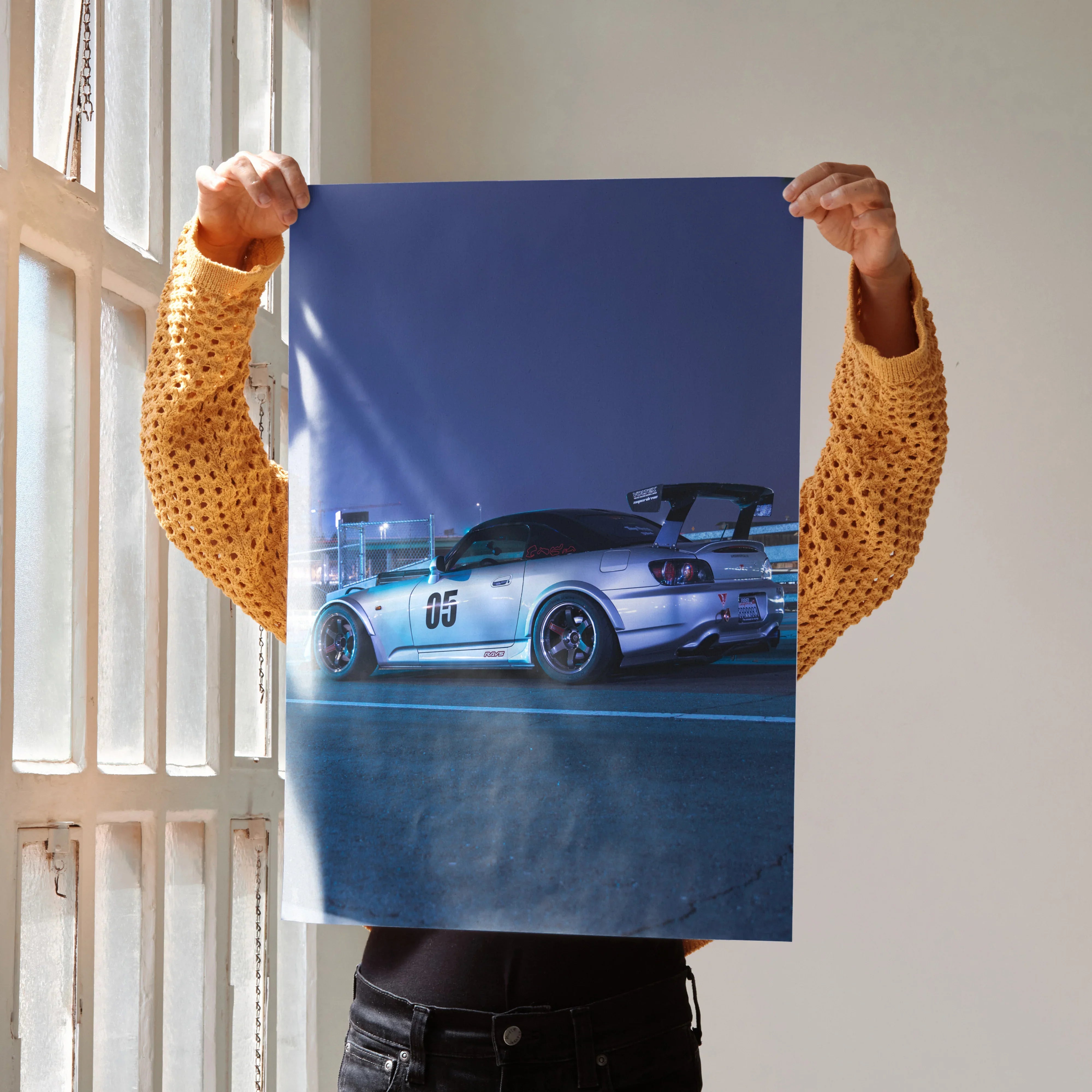 Honda S2000 poster featuring silver sports car in dynamic night scene, wall art for automotive fans.