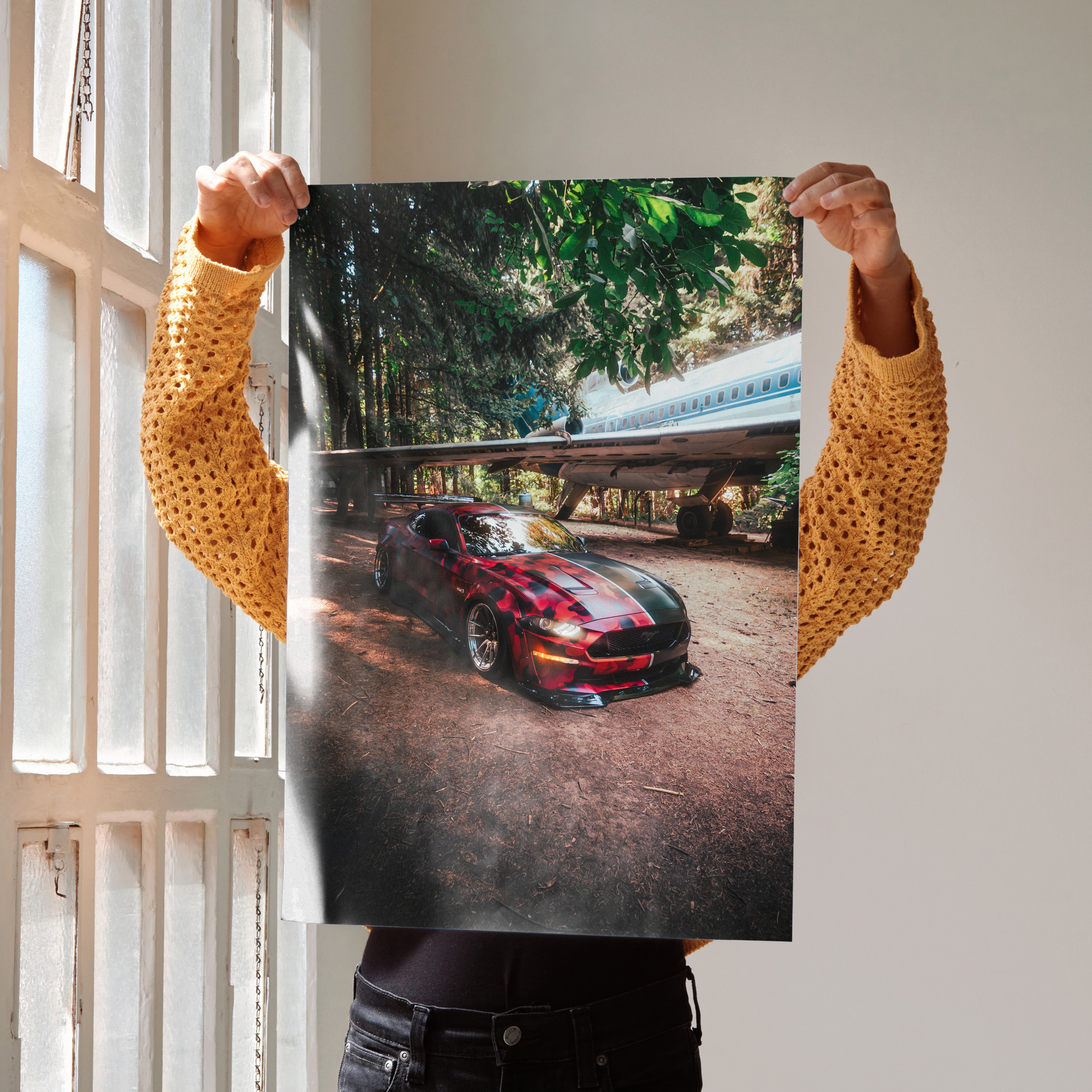 Ford Mustang S550 poster featuring sleek red muscle car under trees, wall art for enthusiasts.