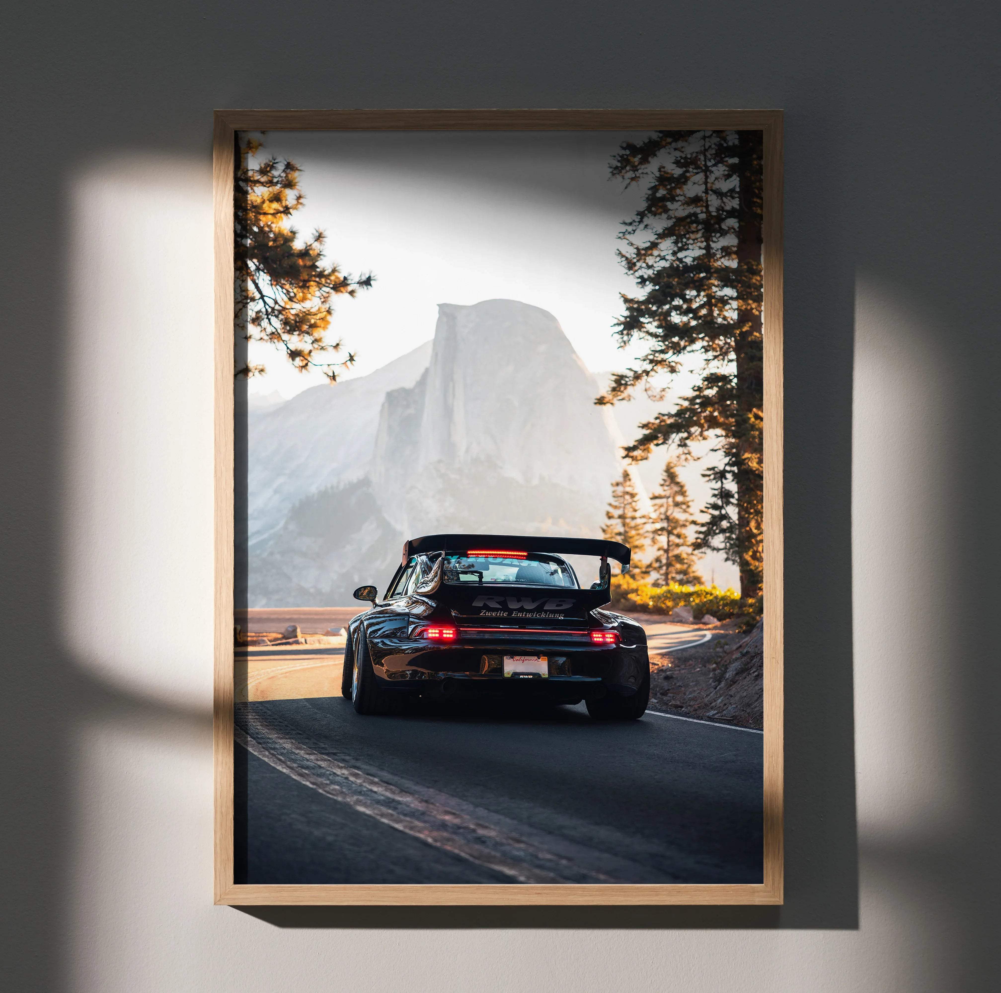 Black Porsche 911 GT3 RS with rear wing in motion on misty mountain road in high resolution RWB Porsche 911 art print