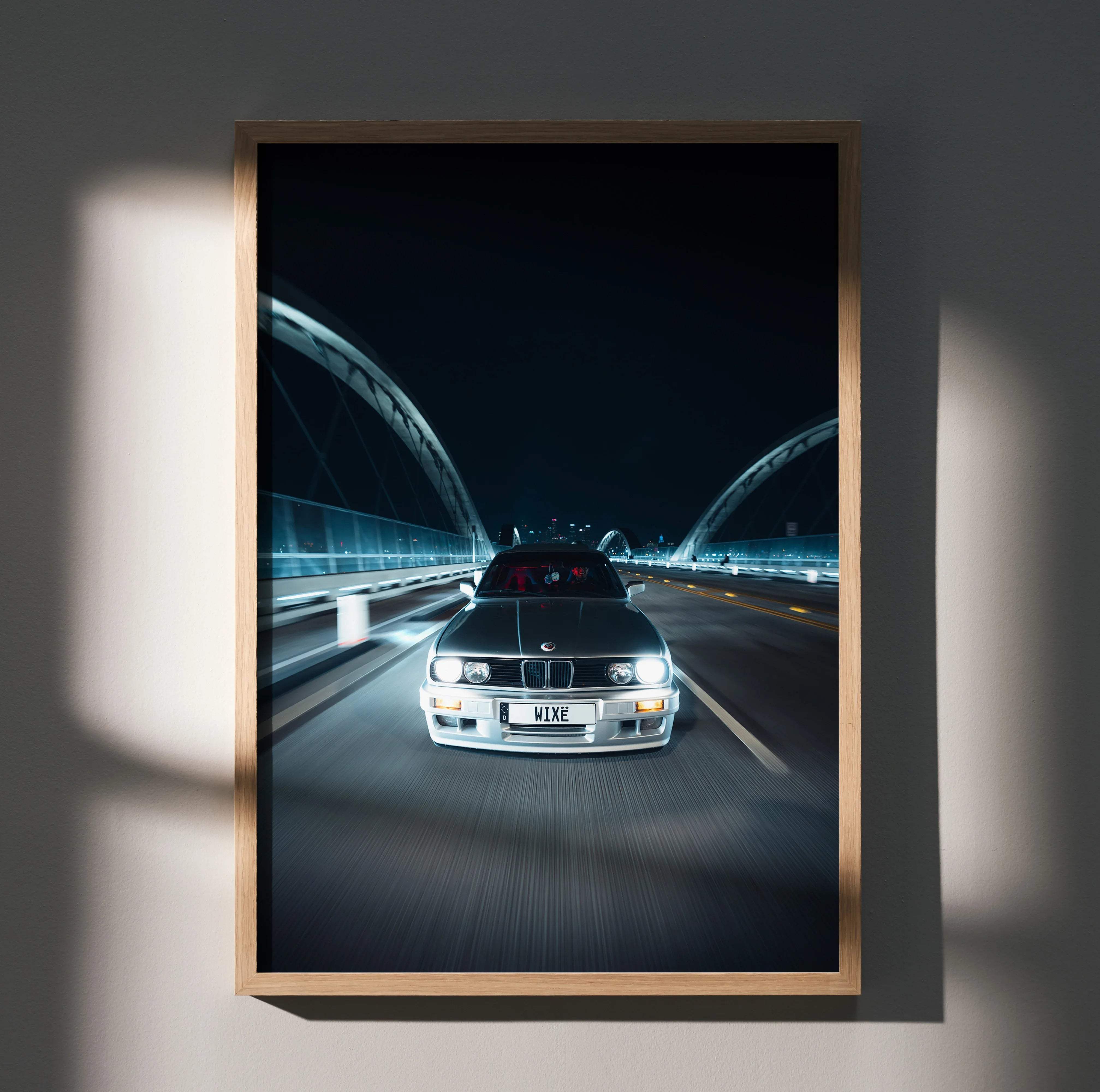 Silver bmw e30 sedan wall art poster framed in light wood high resolution perfect for car lovers decor
