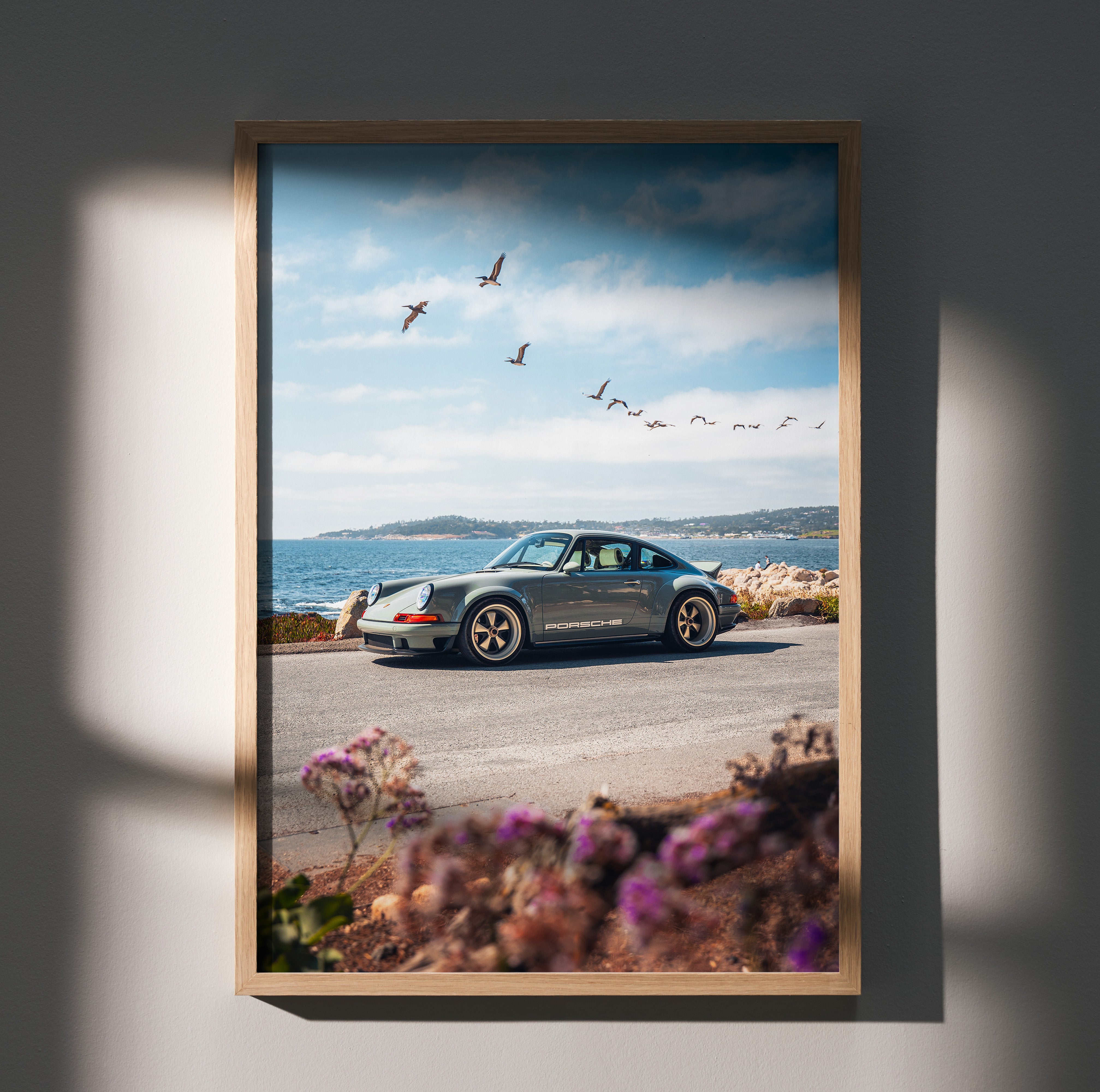 Porsche 911 classic car poster with coastal road and flying birds, high-resolution wall art.