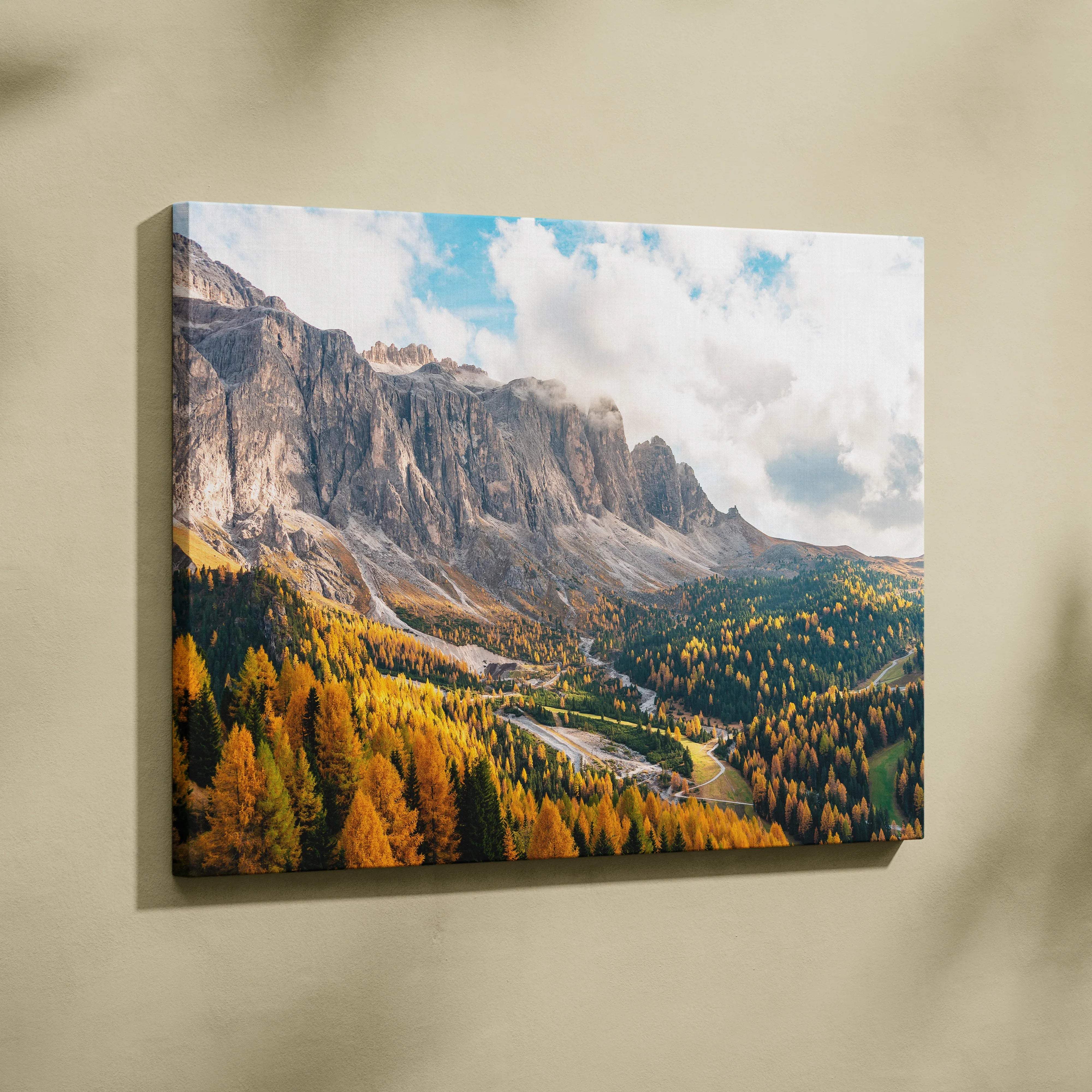 Canvas print of Dramatic Dolomites mountains with autumn forests at golden hour