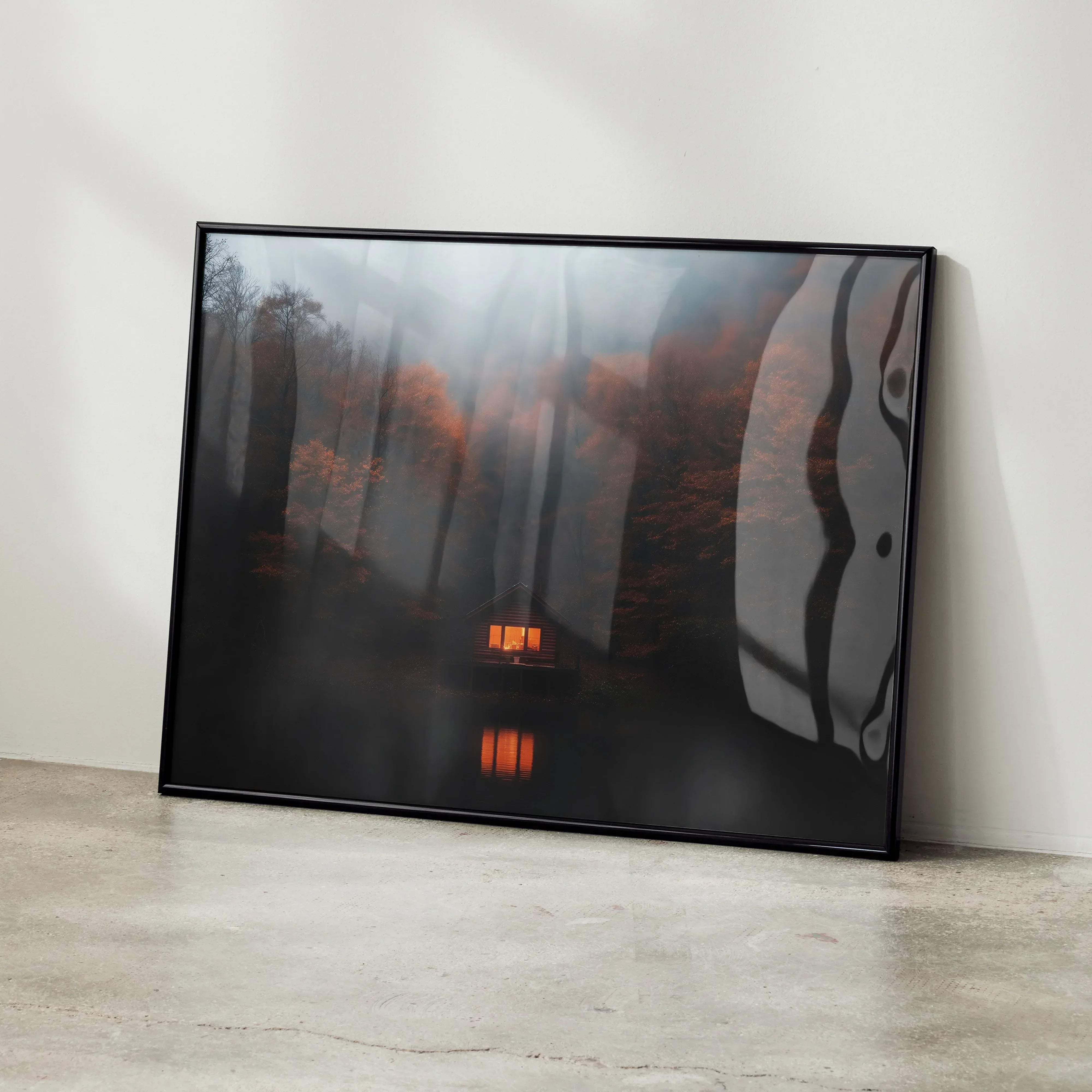 Black-framed vibrant autumn forest digital art poster showing misty forest with autumn trees and cabin reflected in water