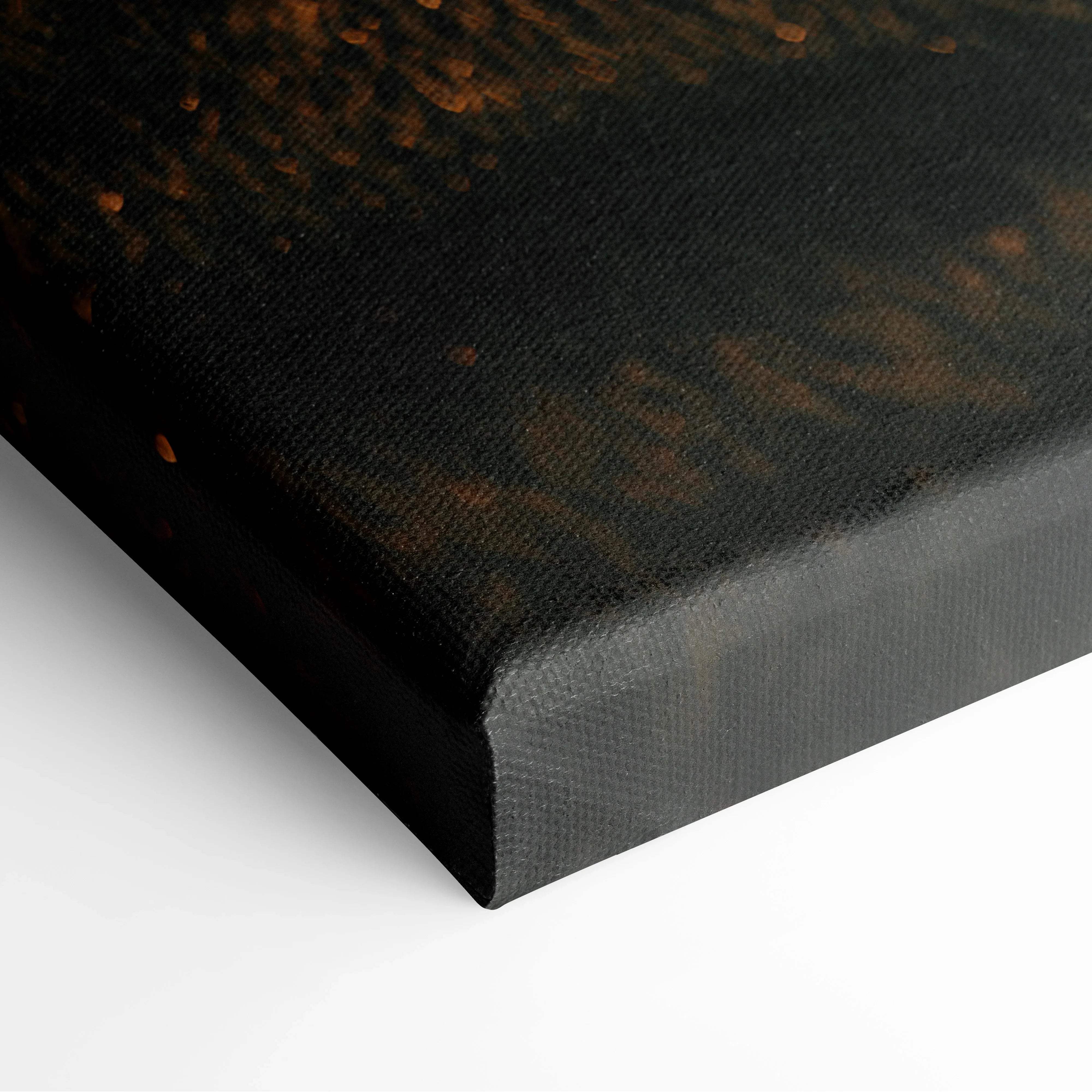 Black canvas print back with textured dark surface and golden-brown speckles