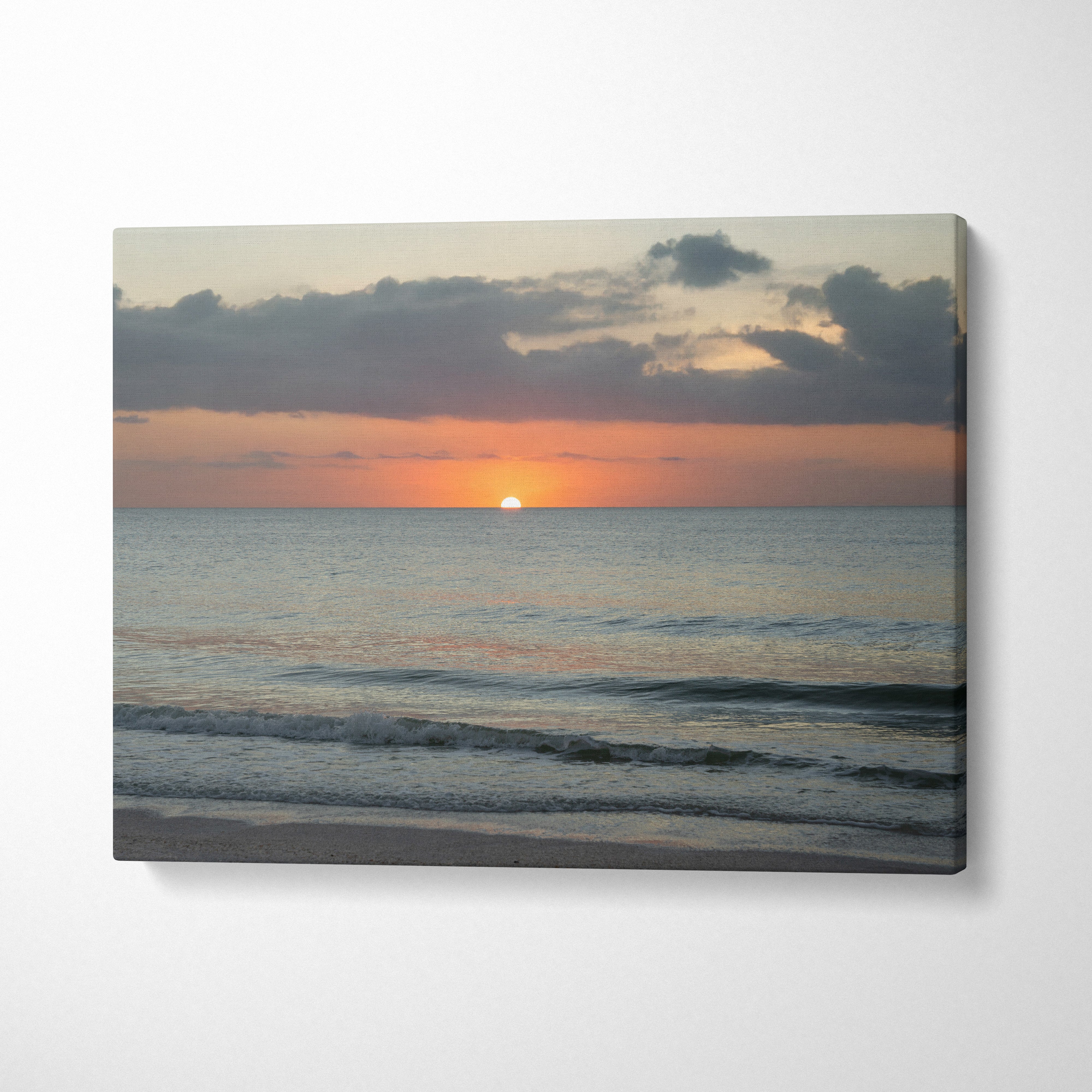 Vibrant sunset beach landscape canvas wall art with calming ocean waves and colorful sky.