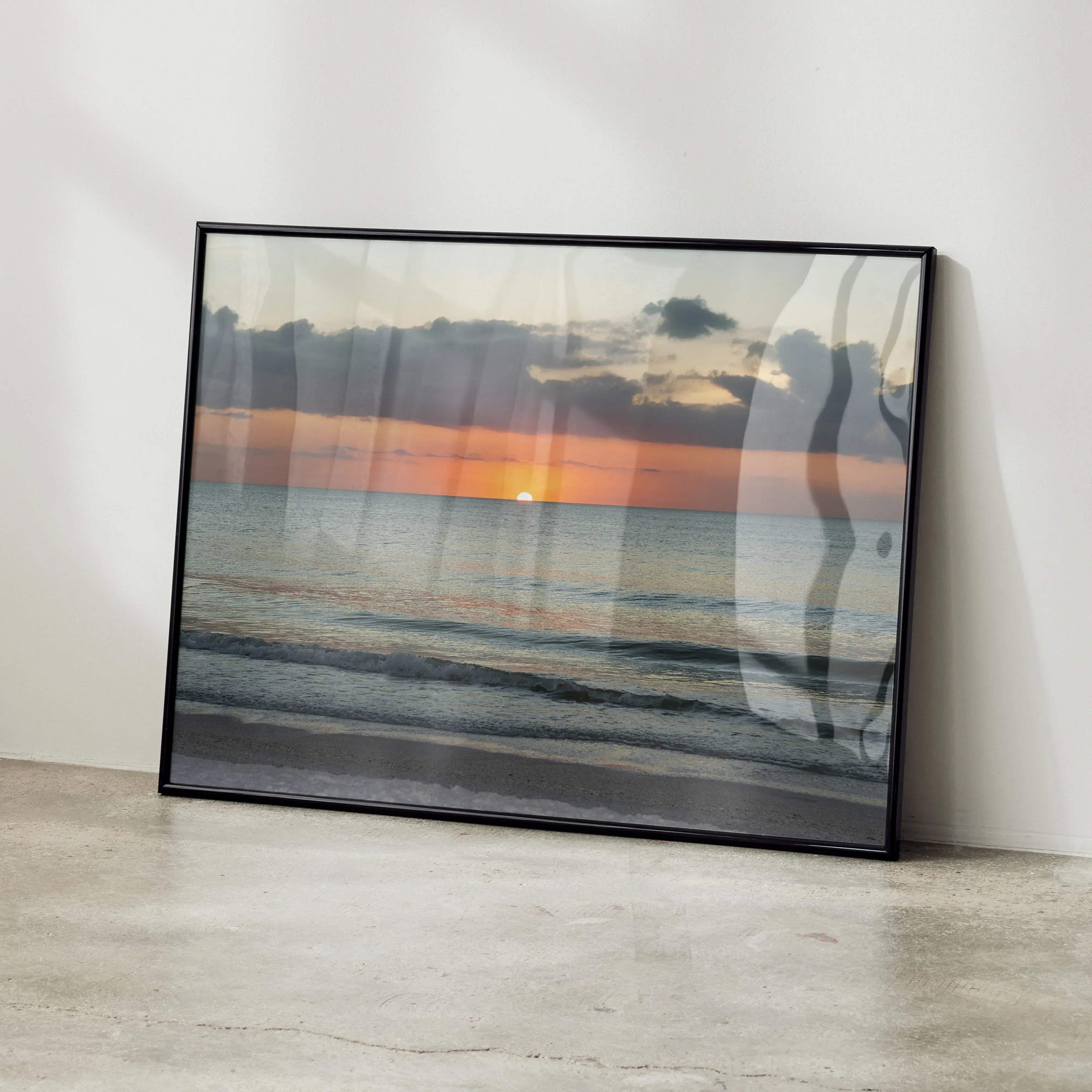 Black-framed beach sunset nature art poster featuring a colorful ocean scene for wall decor