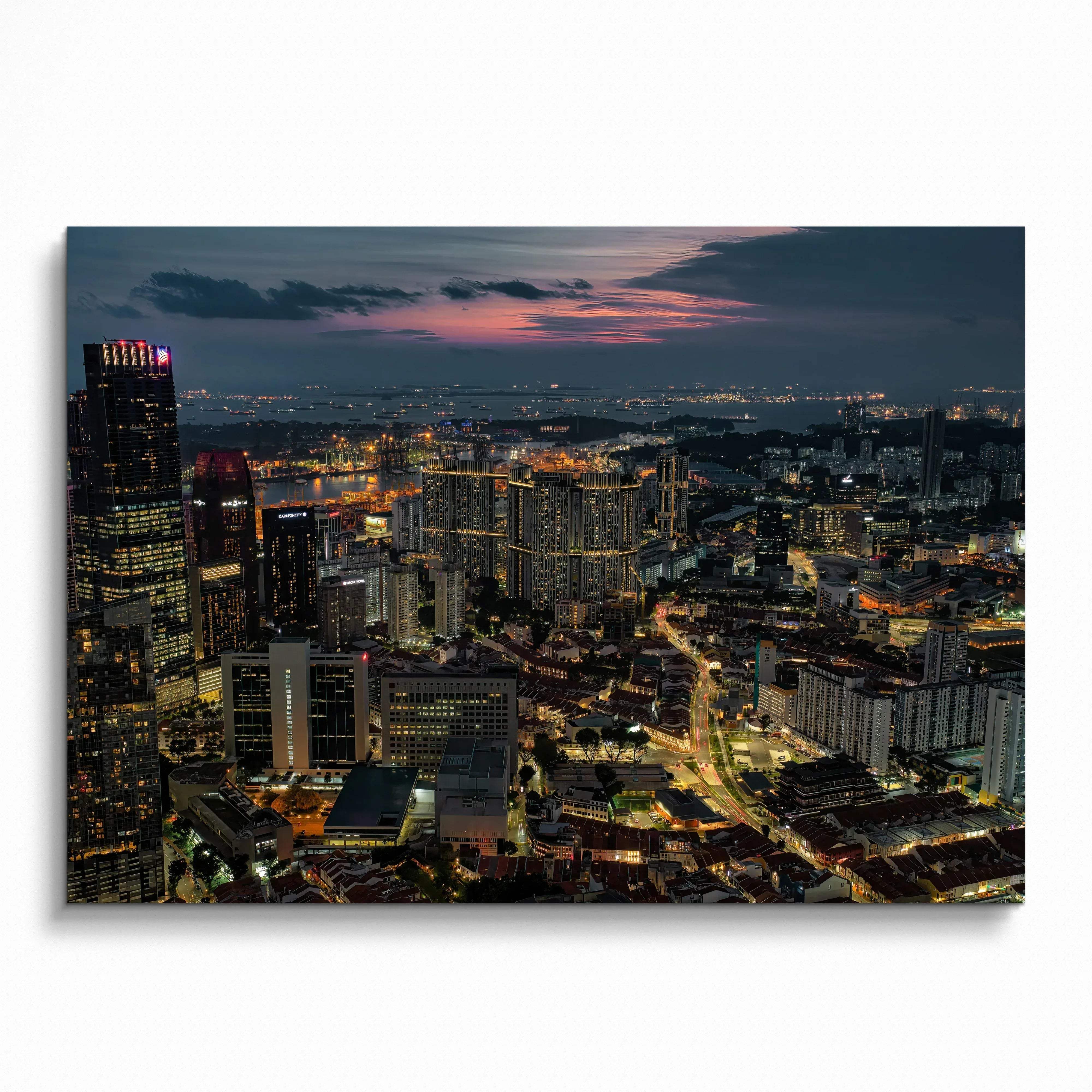 Vibrant city nightscape poster with illuminated buildings and busy streets, wall art showcasing urban lights.