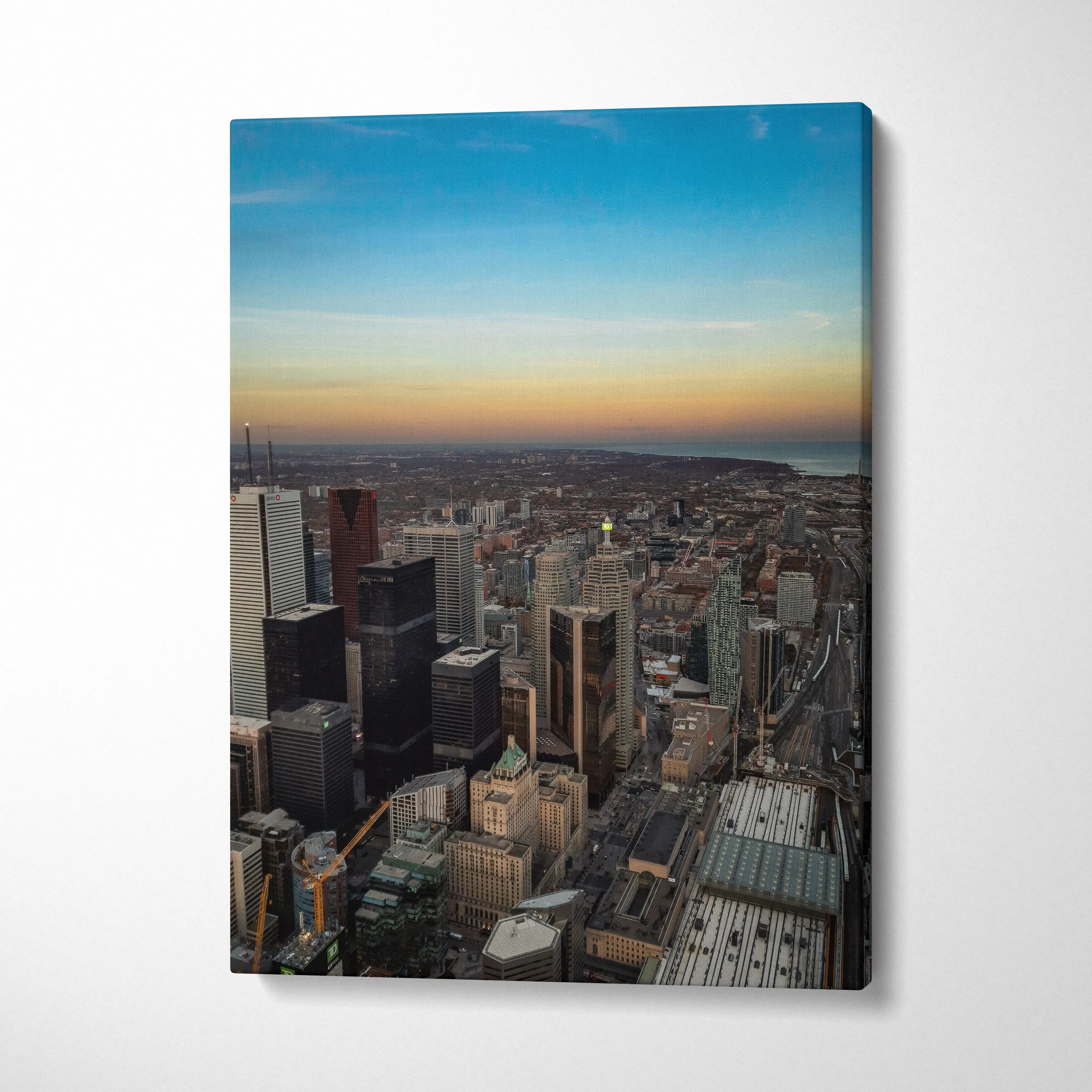 City skyline at sunset canvas wall art with high-resolution urban buildings and vibrant sky.