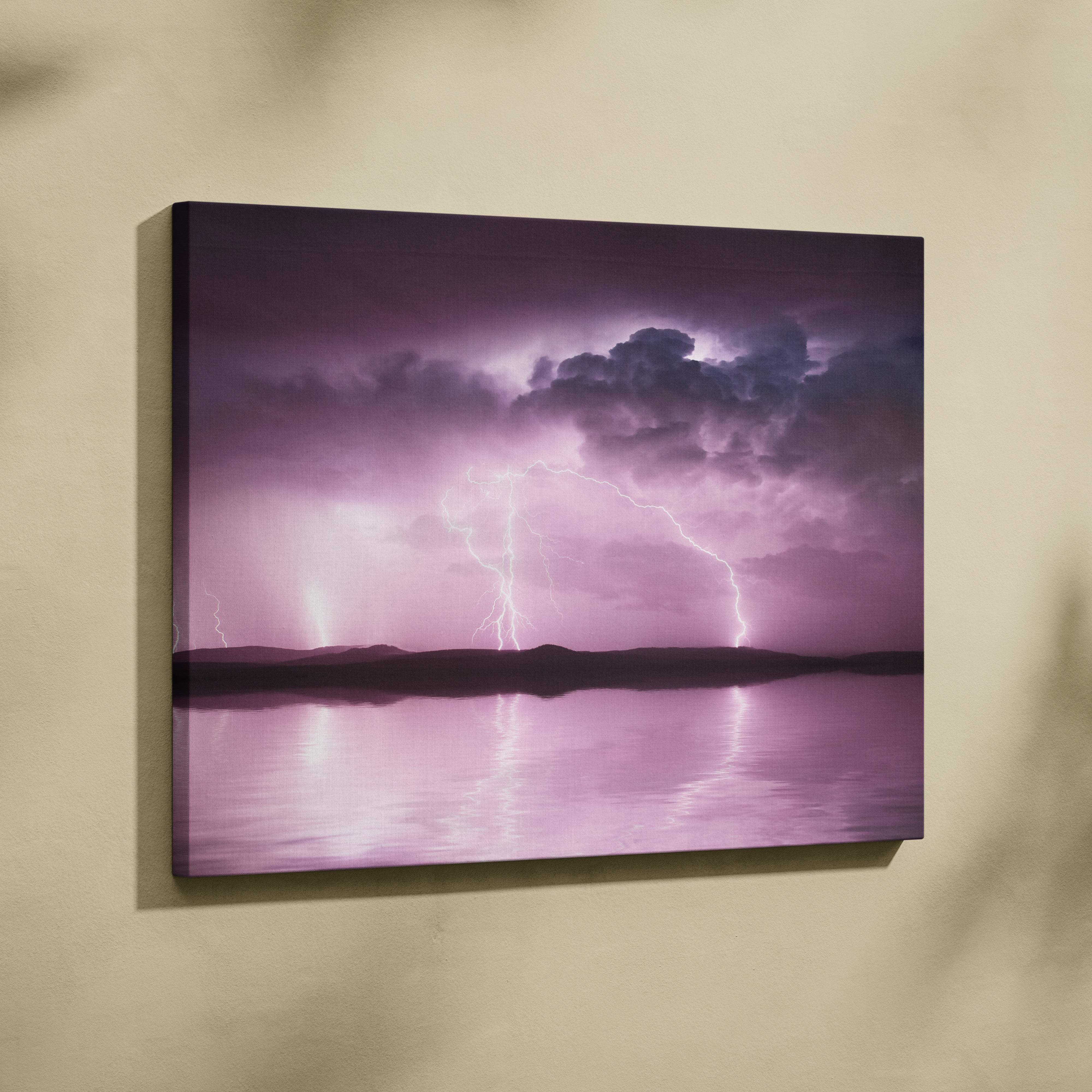 Pink lightning storm canvas art featuring a dramatic purple sky and reflective water in a dreamy landscape print