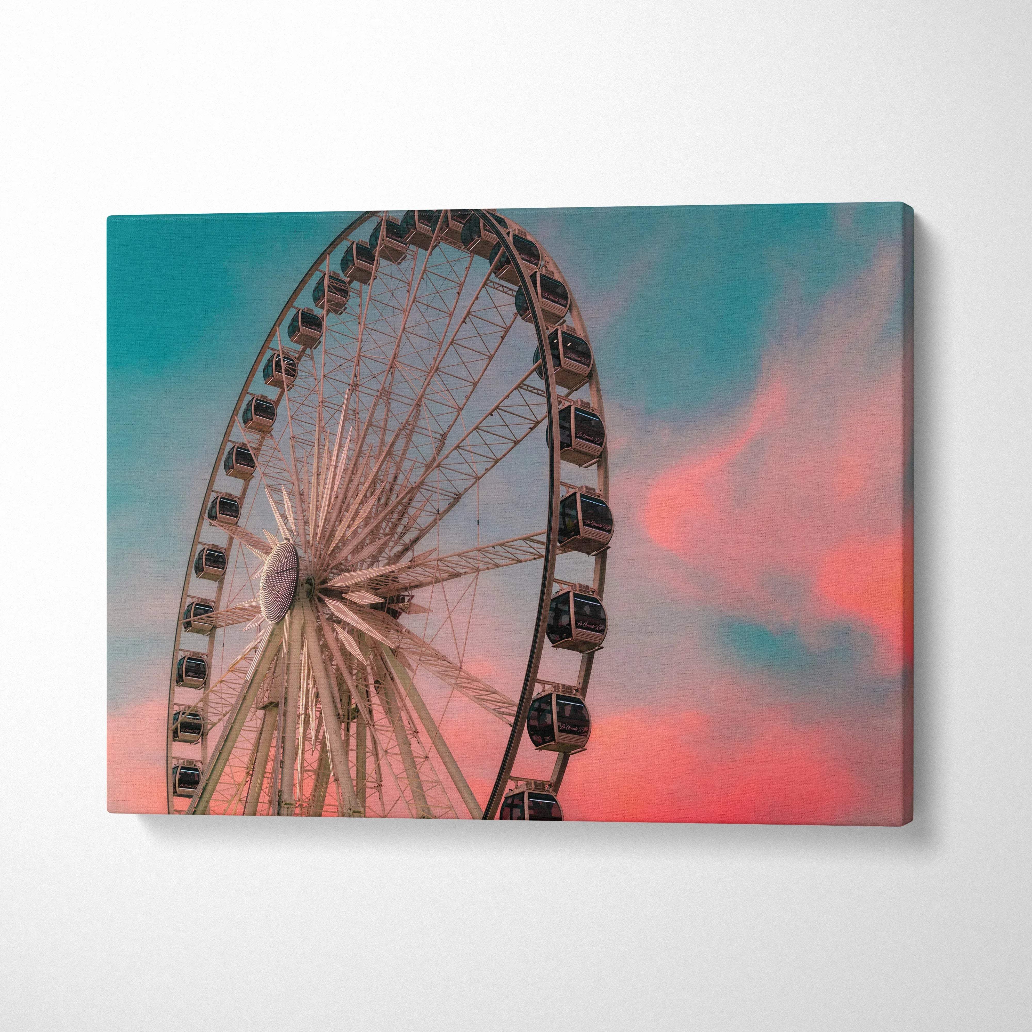 Canvas wall art of a large Ferris wheel against a vibrant pink and blue sunset sky.