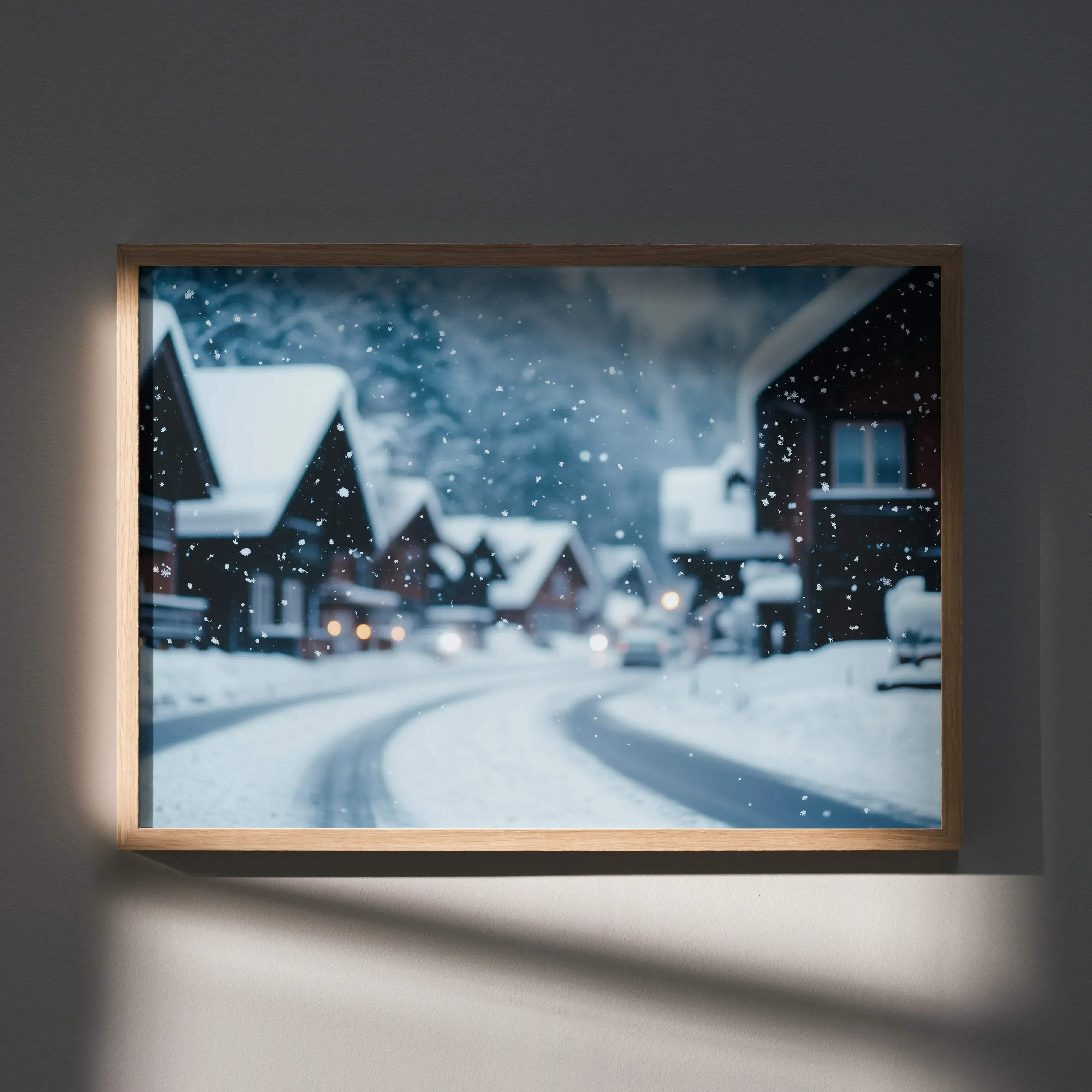 A framed serene snow landscape digital art poster featuring a winter village scene with snow-covered rooftops in a light wood frame