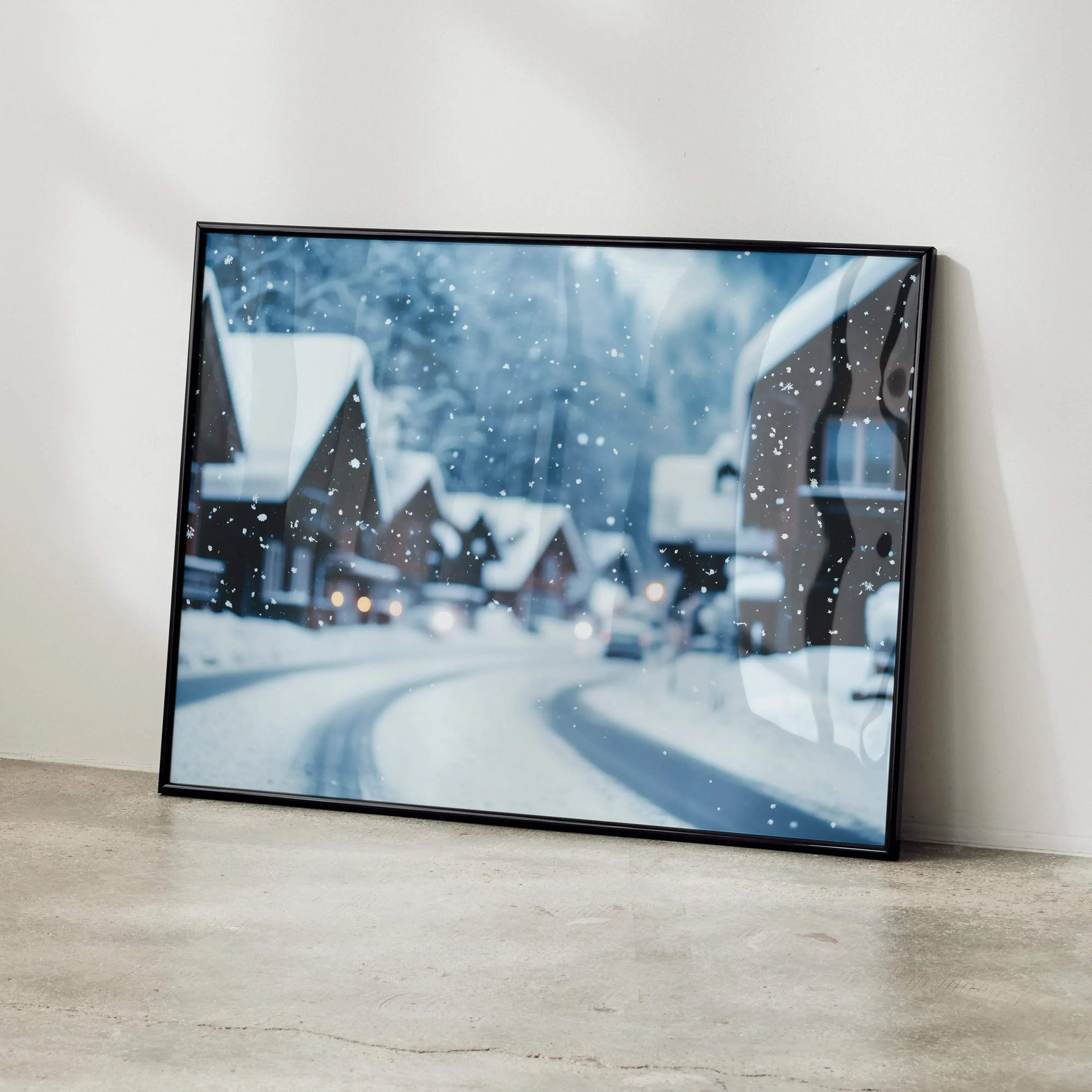 Black-framed serene snow landscape digital art poster featuring a snowy village street scene in soft blue and white tones