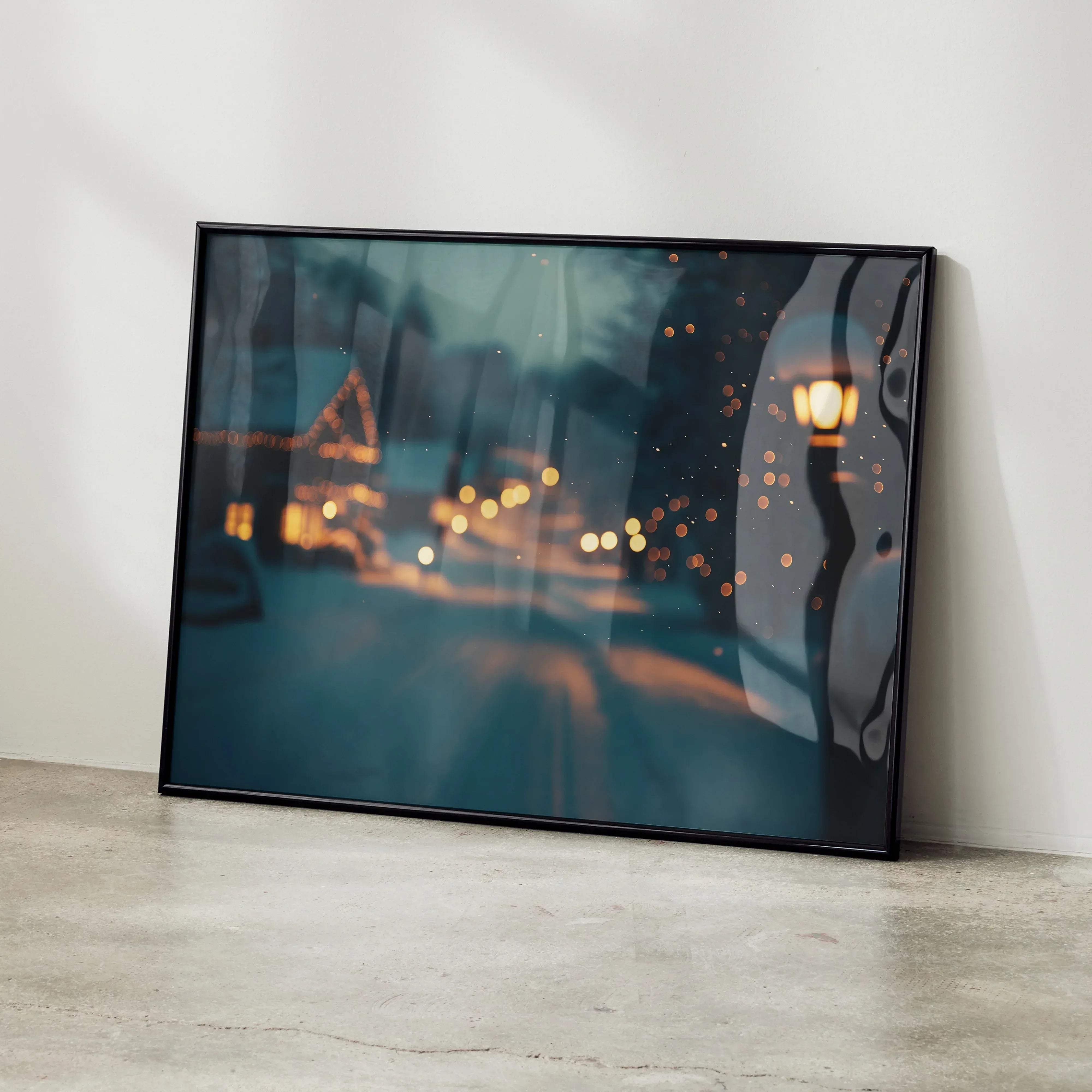 Black-framed digital art poster of a moody rainy street scene with warm bokeh lights and blurred trees titled serene snowy landscape