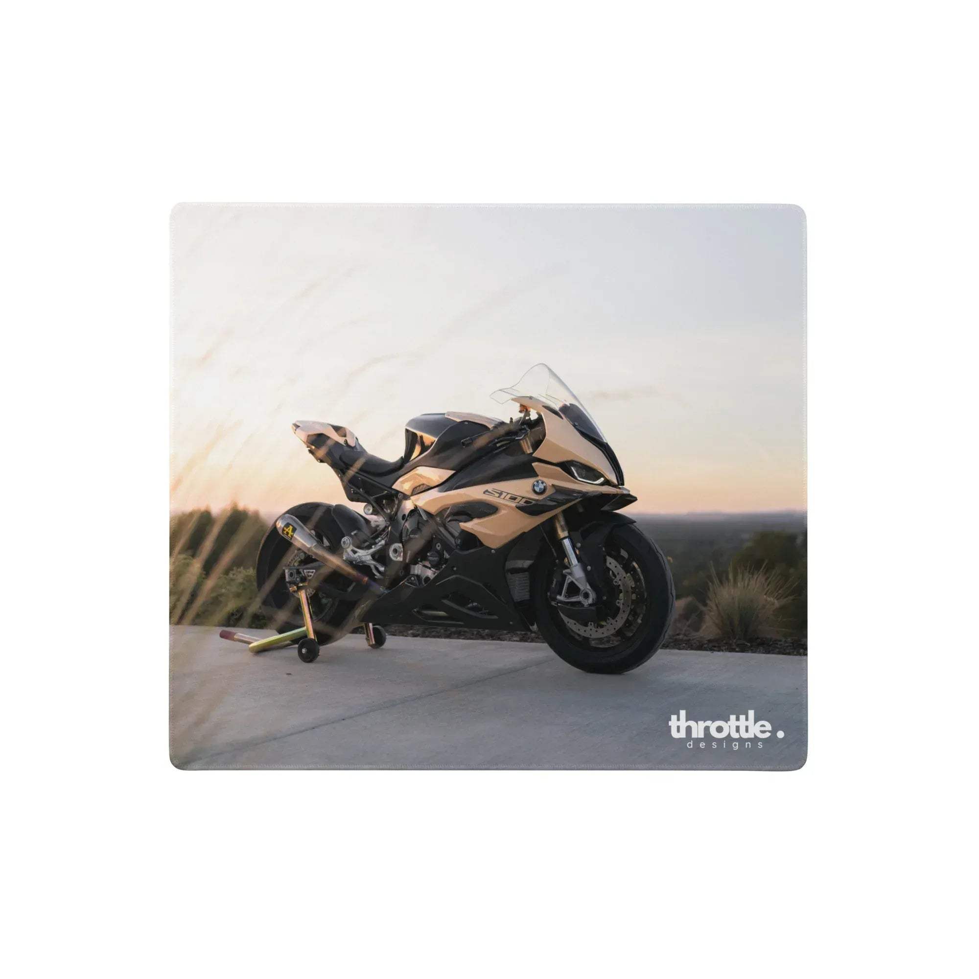 Bmw inspired s1000rr gaming mouse pad featuring a sleek black and gold s1000rr motorcycle with aerodynamic fairings