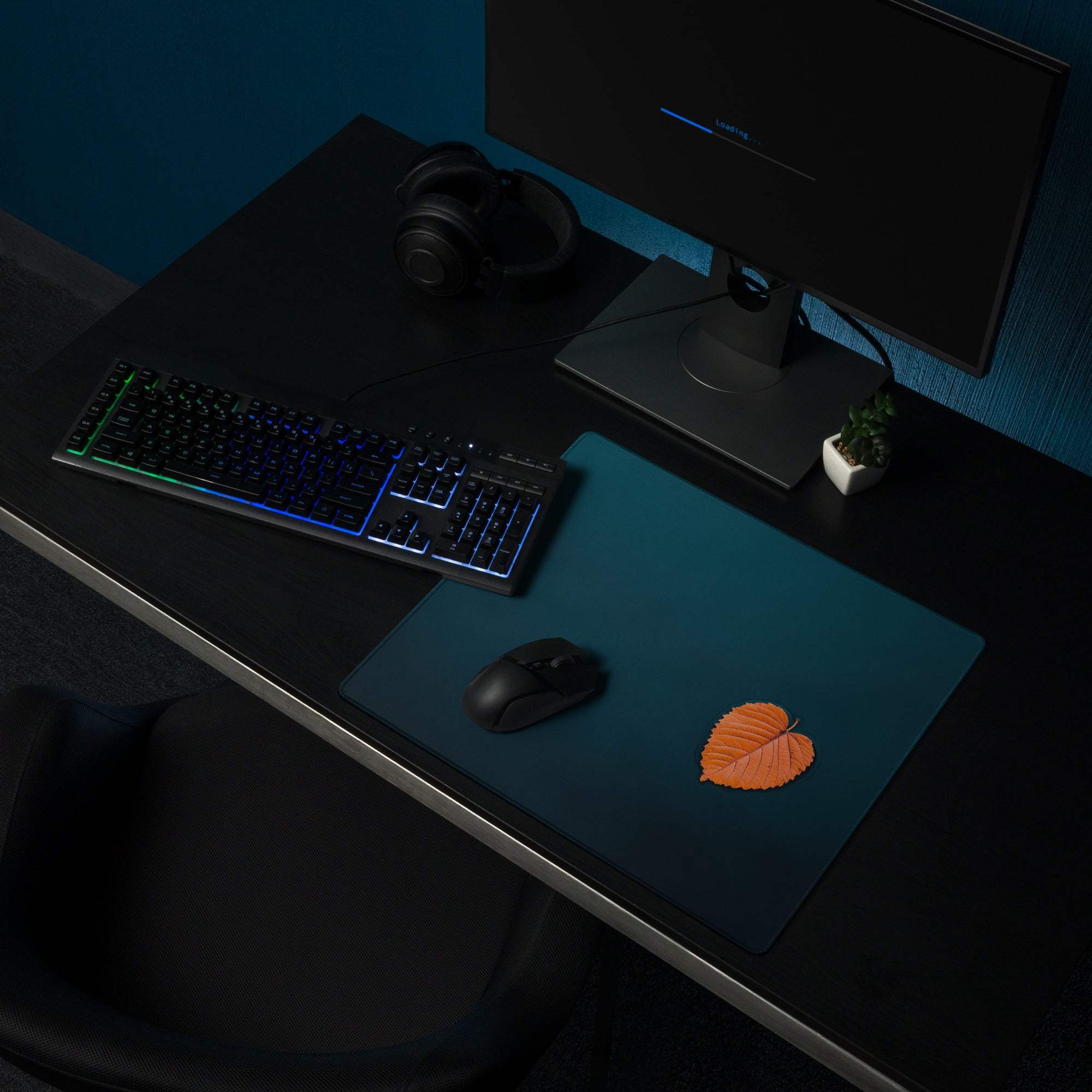 Orange leaf-shaped professional large gaming mouse pad in deep ocean blue