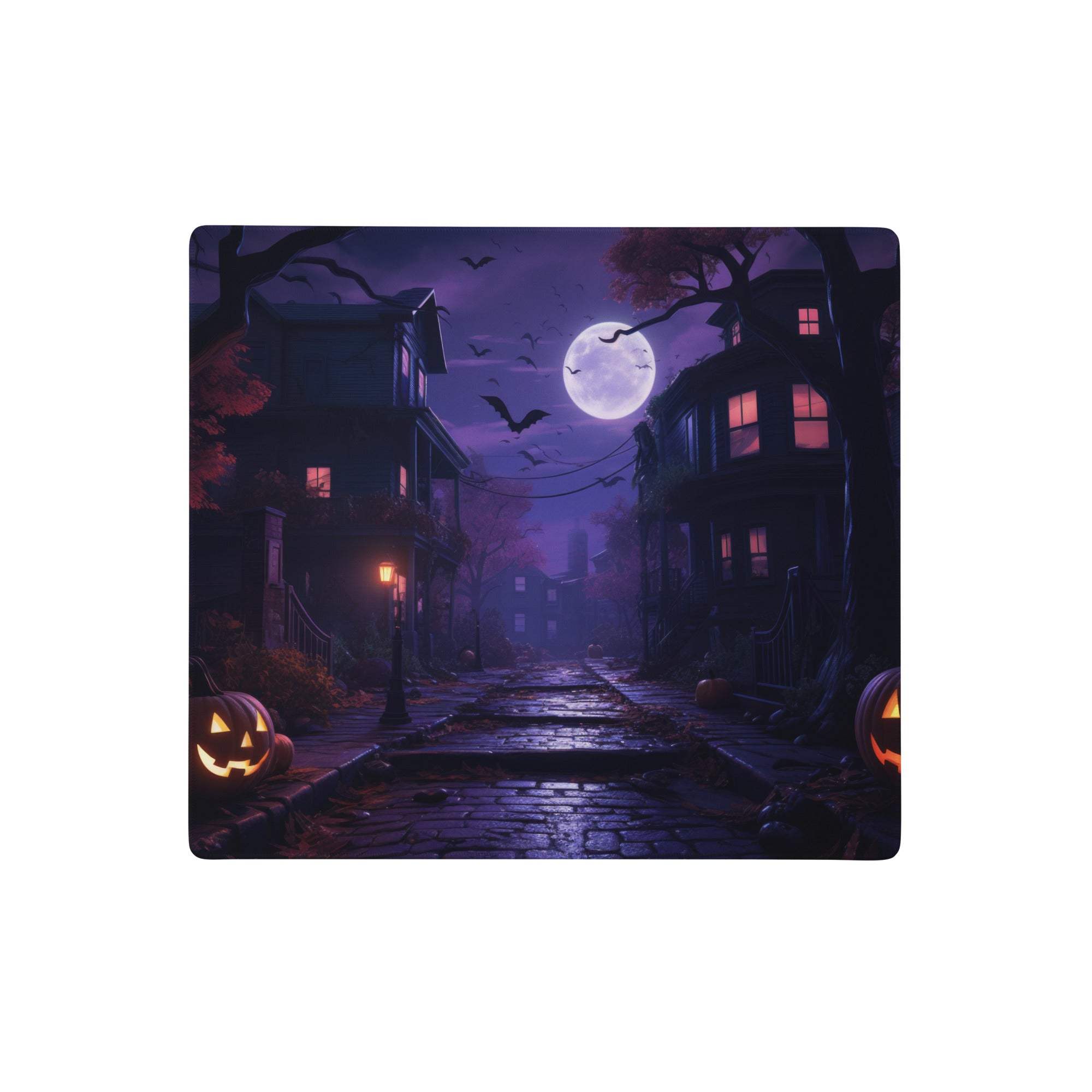 Halloween moonlit street scene mouse pad featuring a spooky purple cobblestone street with jack o lanterns and bats