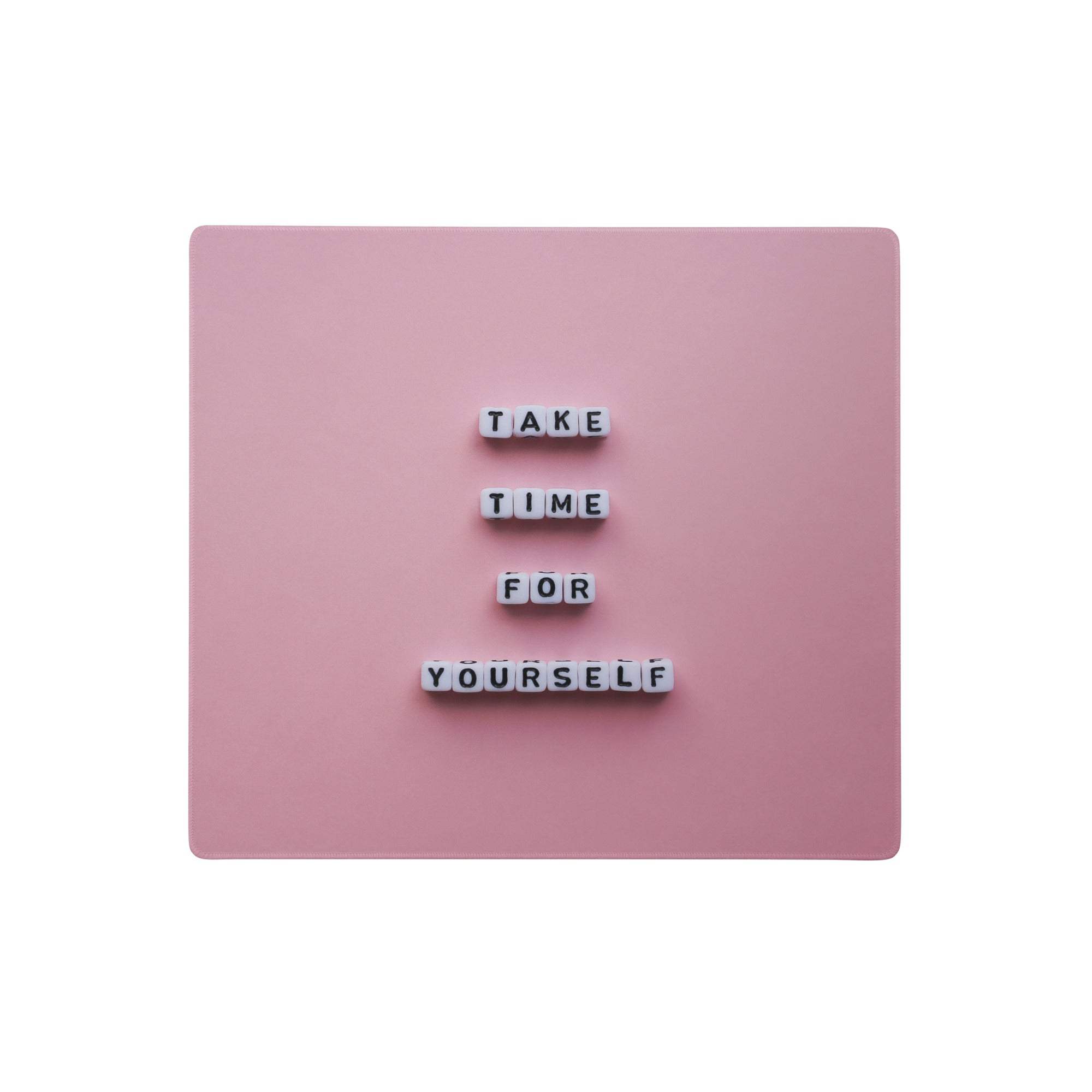 Pastel pink rectangular magnetic letter board with white letters displaying take time for yourself for home office use