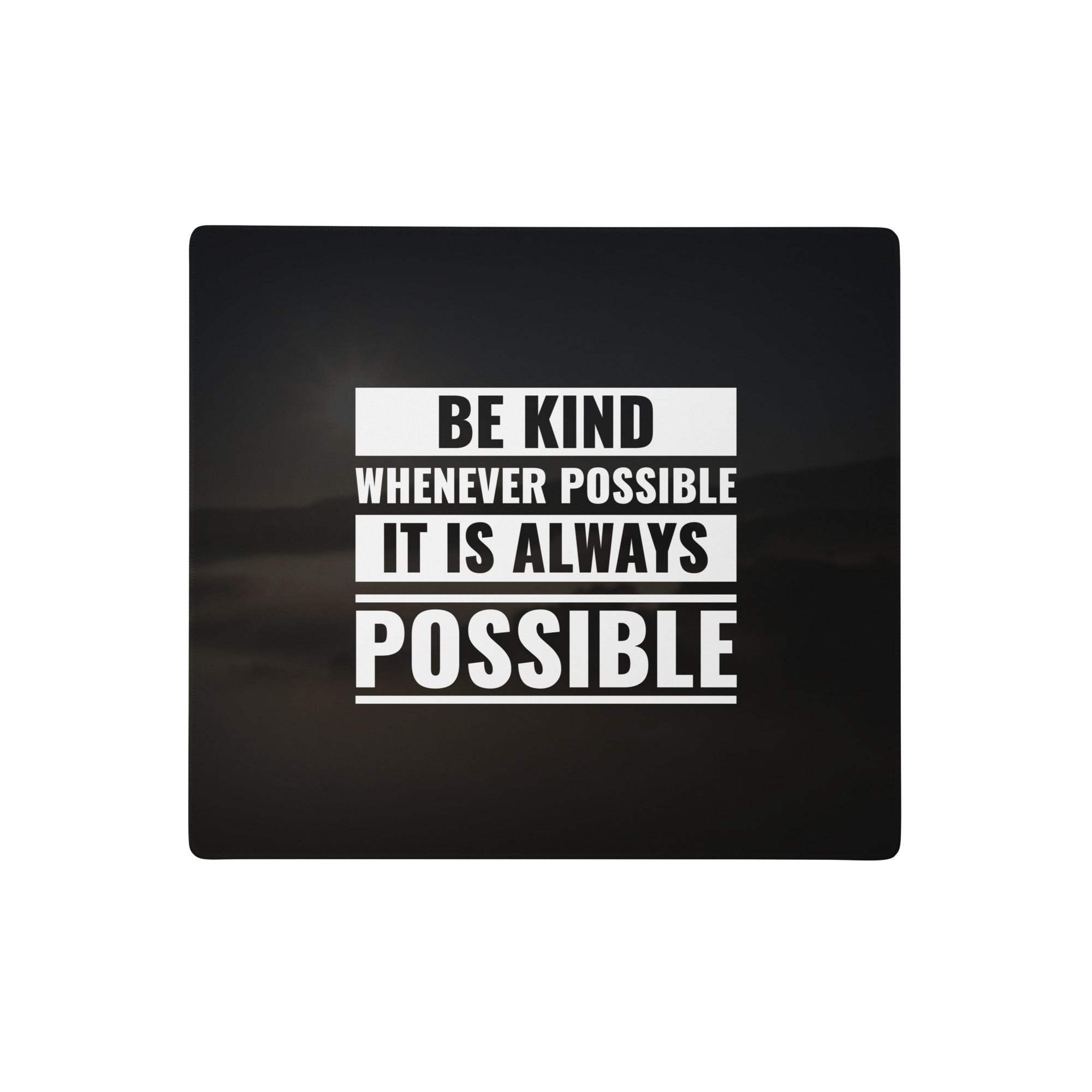 Black rectangular large gaming mouse pad with white bold be kind whenever possible motivational text print