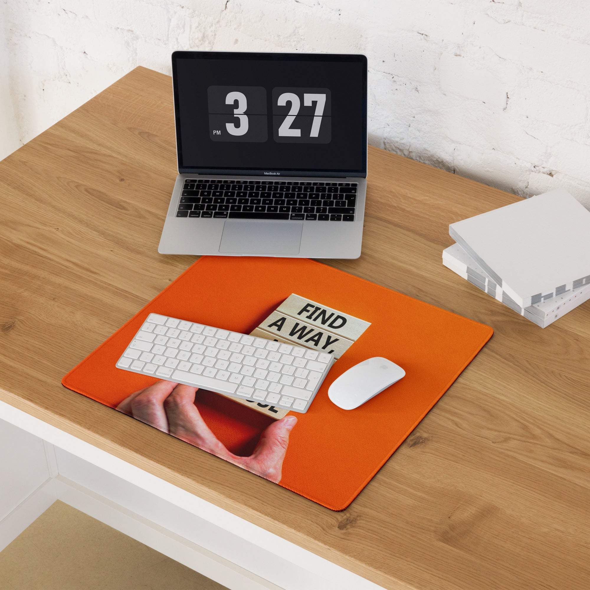 Orange rectangular mouse pad with hands holding papers that read find a way minimalist modern office desk decor