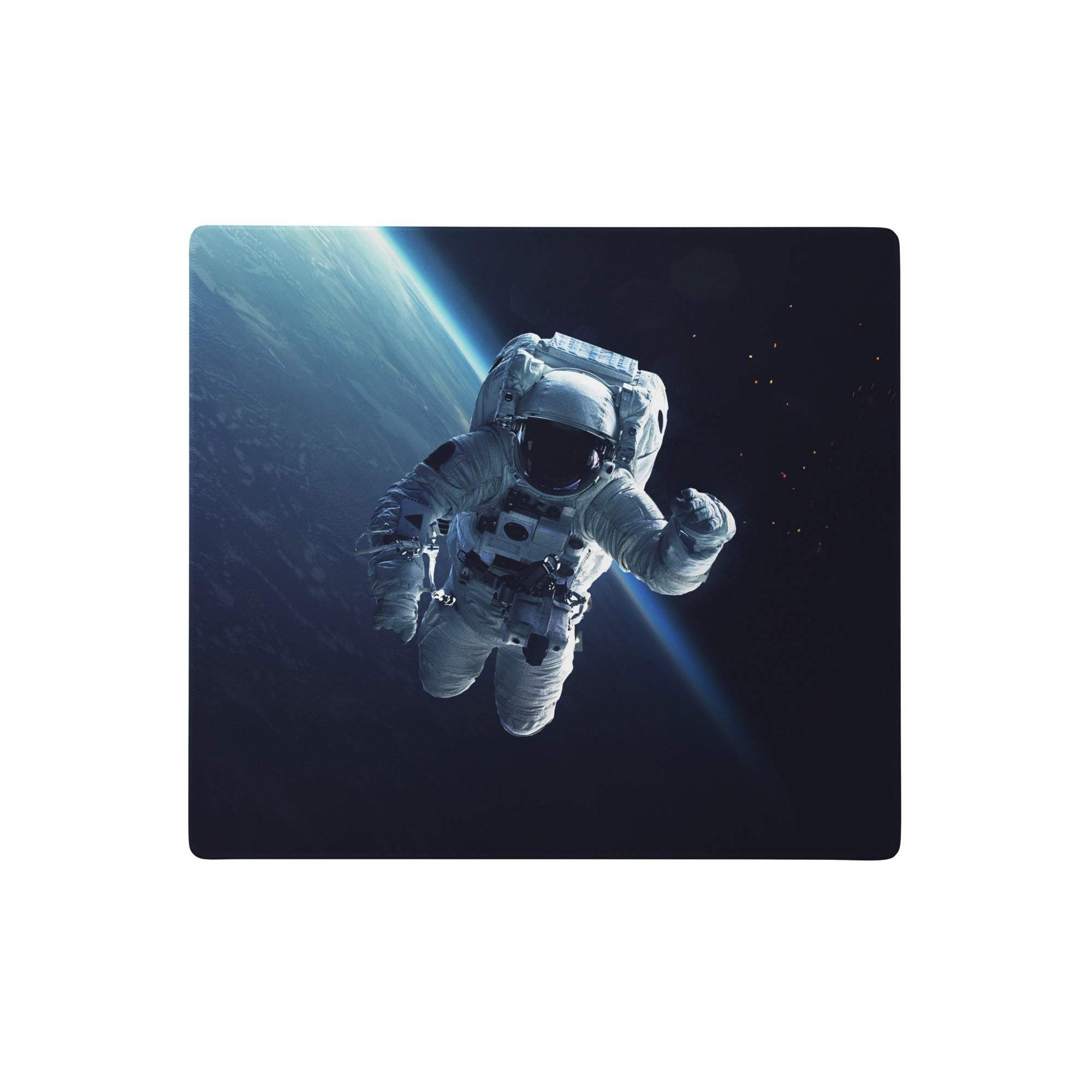 A sleek rectangular cosmic space odyssey gaming mouse pad with an astronaut near earth on a blue black space background