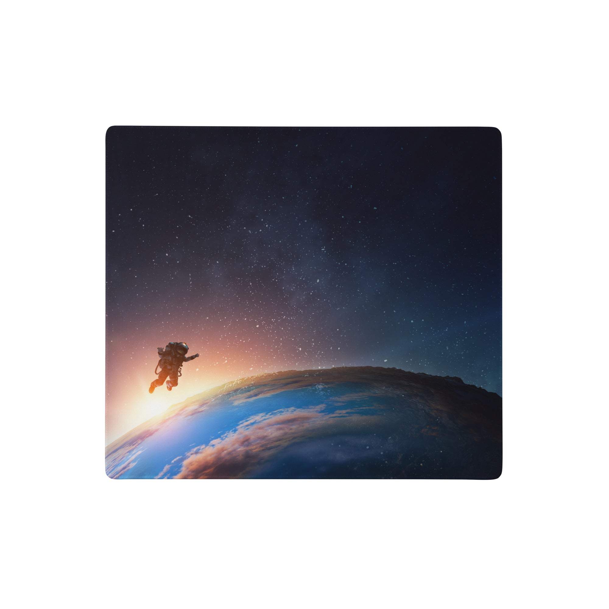 Cosmic astronaut desk pad with dark blue and black space theme showing astronaut silhouette over earth for gaming and office use