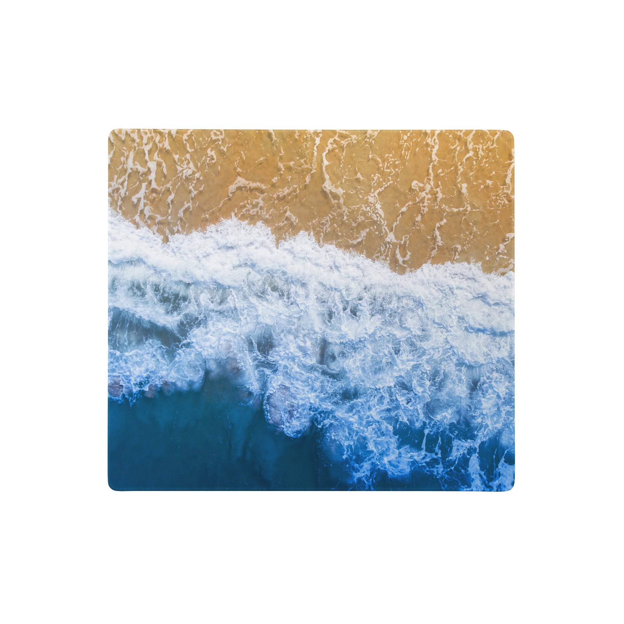A rectangular coastal ocean wave mouse pad with vivid blue ocean waves and golden sand for desk gaming decor