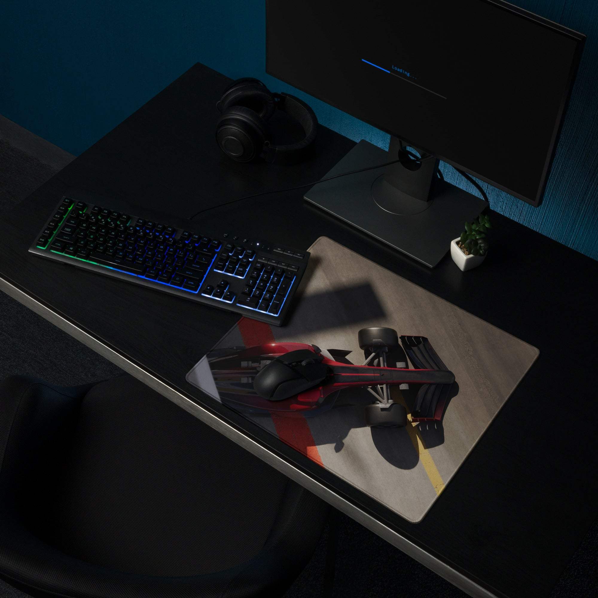 Red and black formula 1 race car graphic mousepad with sleek glossy finish for gaming desk and modern tech decor