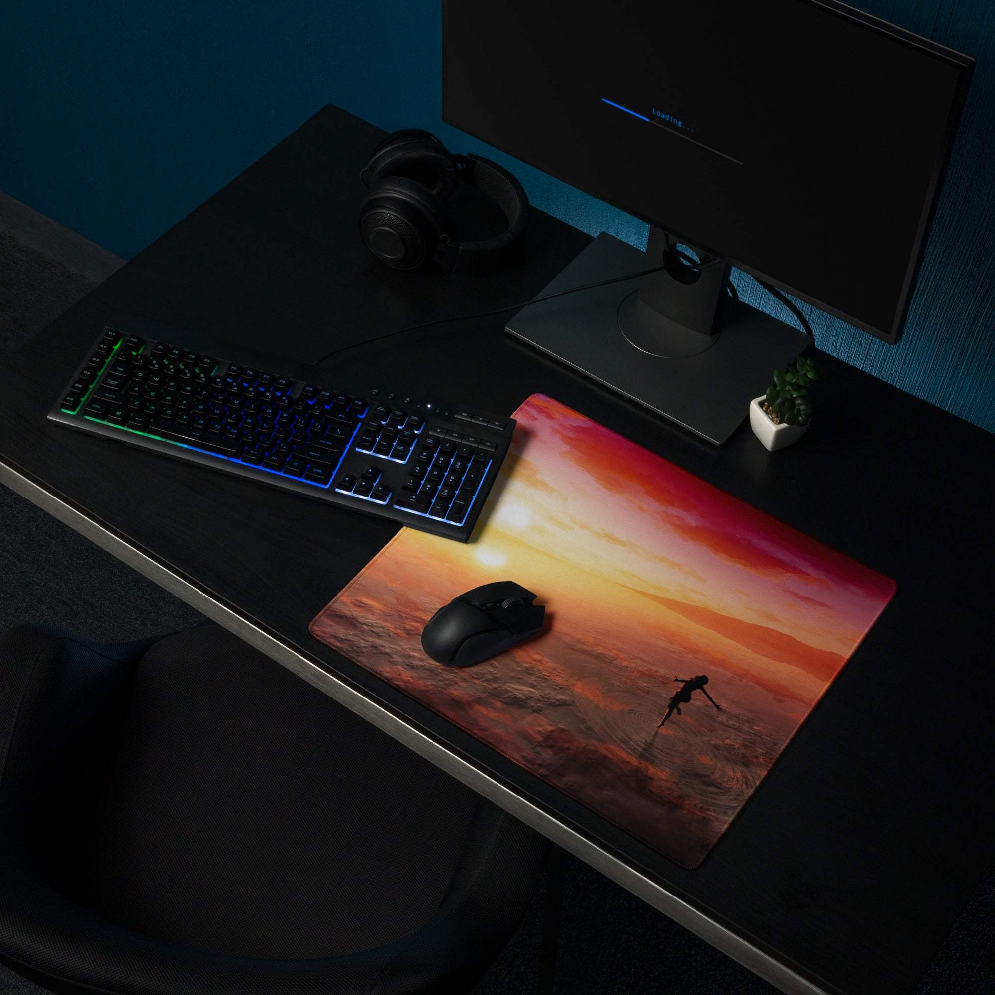 Sunset beach gaming pad featuring a vibrant sunset silhouette in warm orange and red fabric texture for desk setup