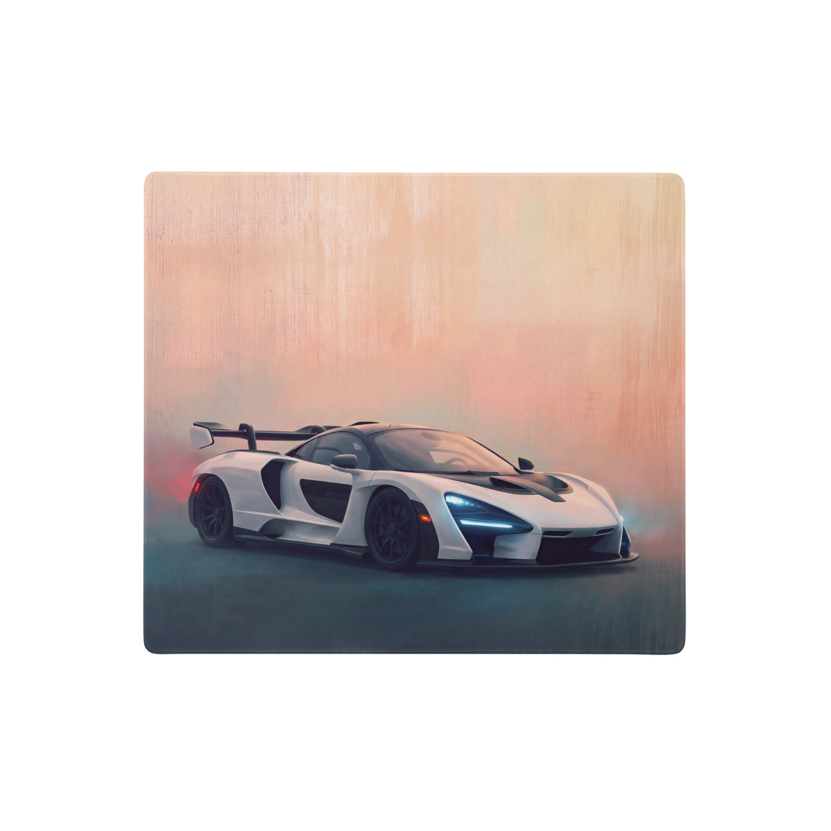 McLaren Senna inspired pure white desk pad with stitched edge features white McLaren sports car with blue headlights on wood plaque