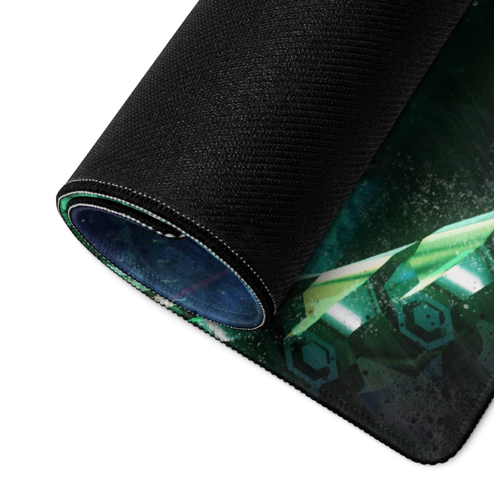 A rolled-up neon cyberpunk blue teal mouse pad with a dark green black futuristic design and glowing neon accents