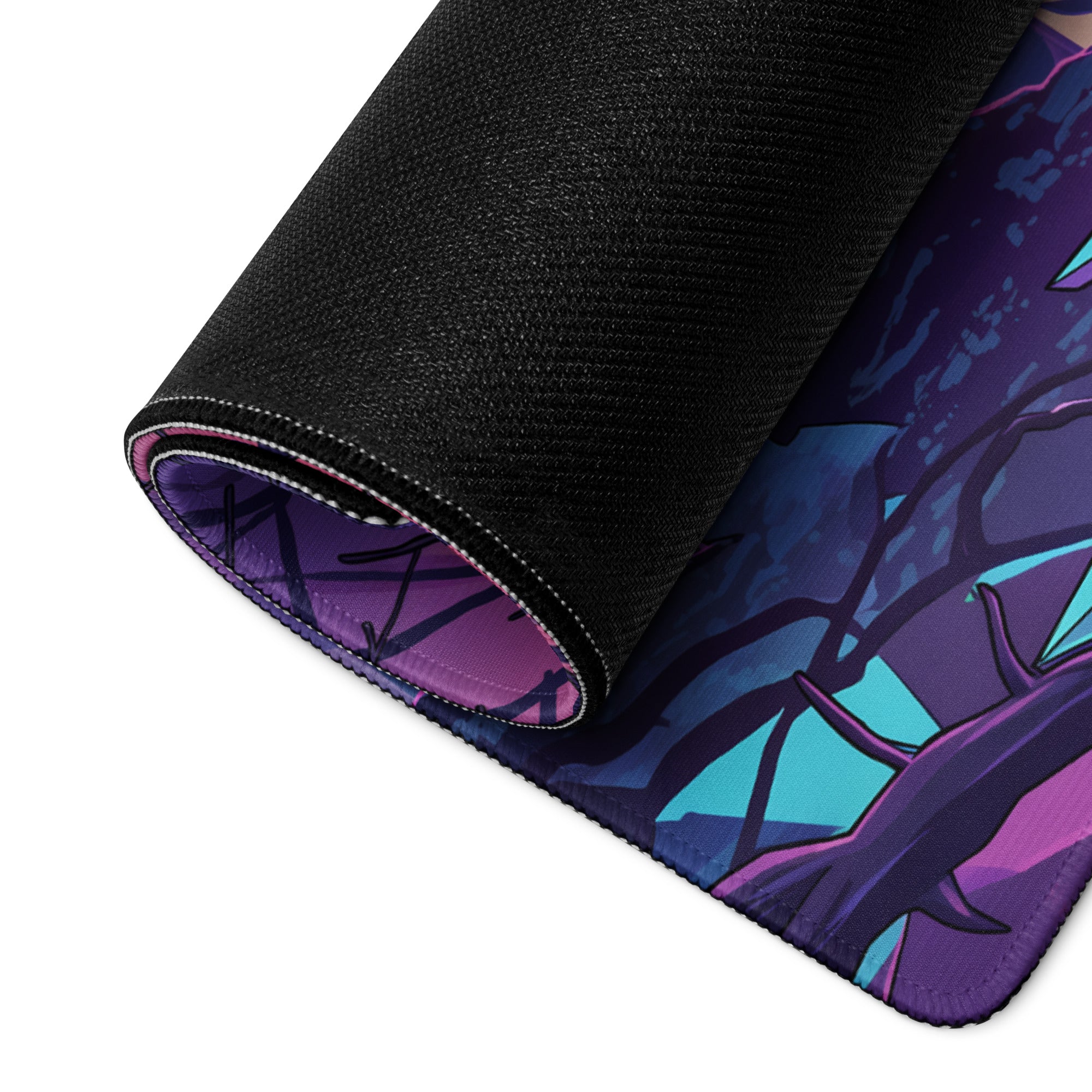 A rolled-up dreamscape vaporwave mouse pad with a purple teal forest design and black fabric border for gaming use