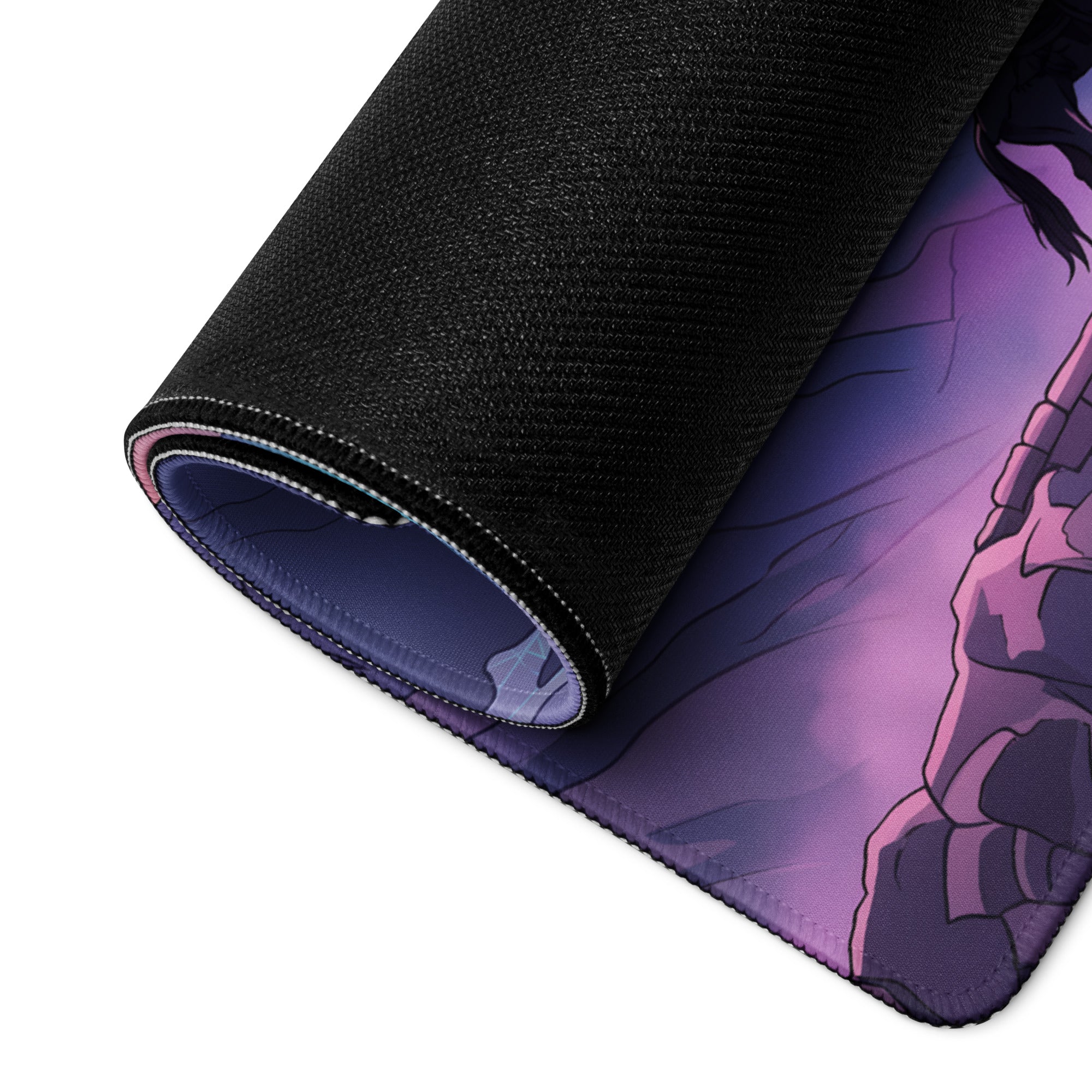 A rolled-up black gaming mousepad with a vibrant purple and pink anime-style vaporwave mountain illustration