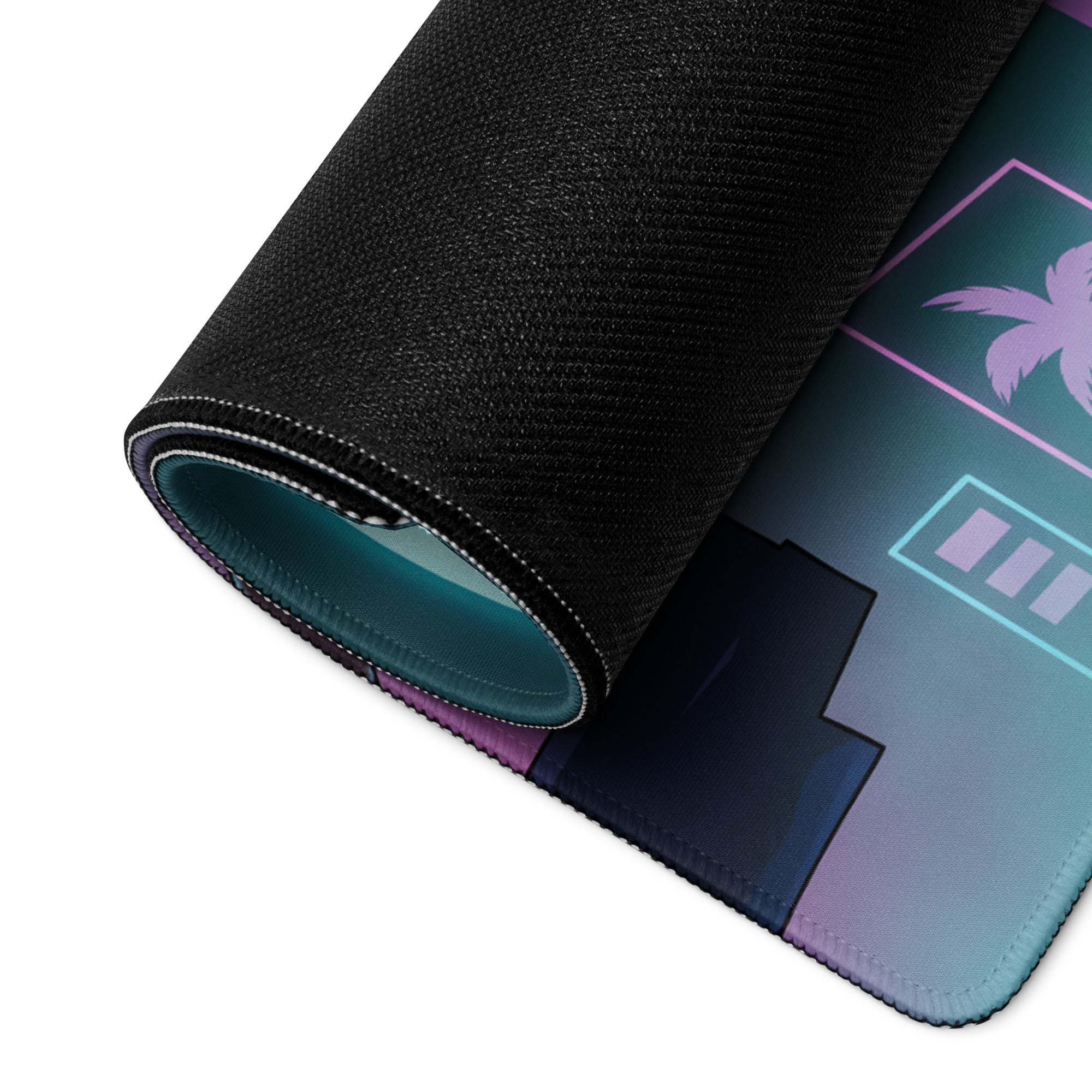 A rolled-up neon vaporwave gaming mouse pad with a black textured outer layer and teal inner lining featuring purple blue palm trees and digital art