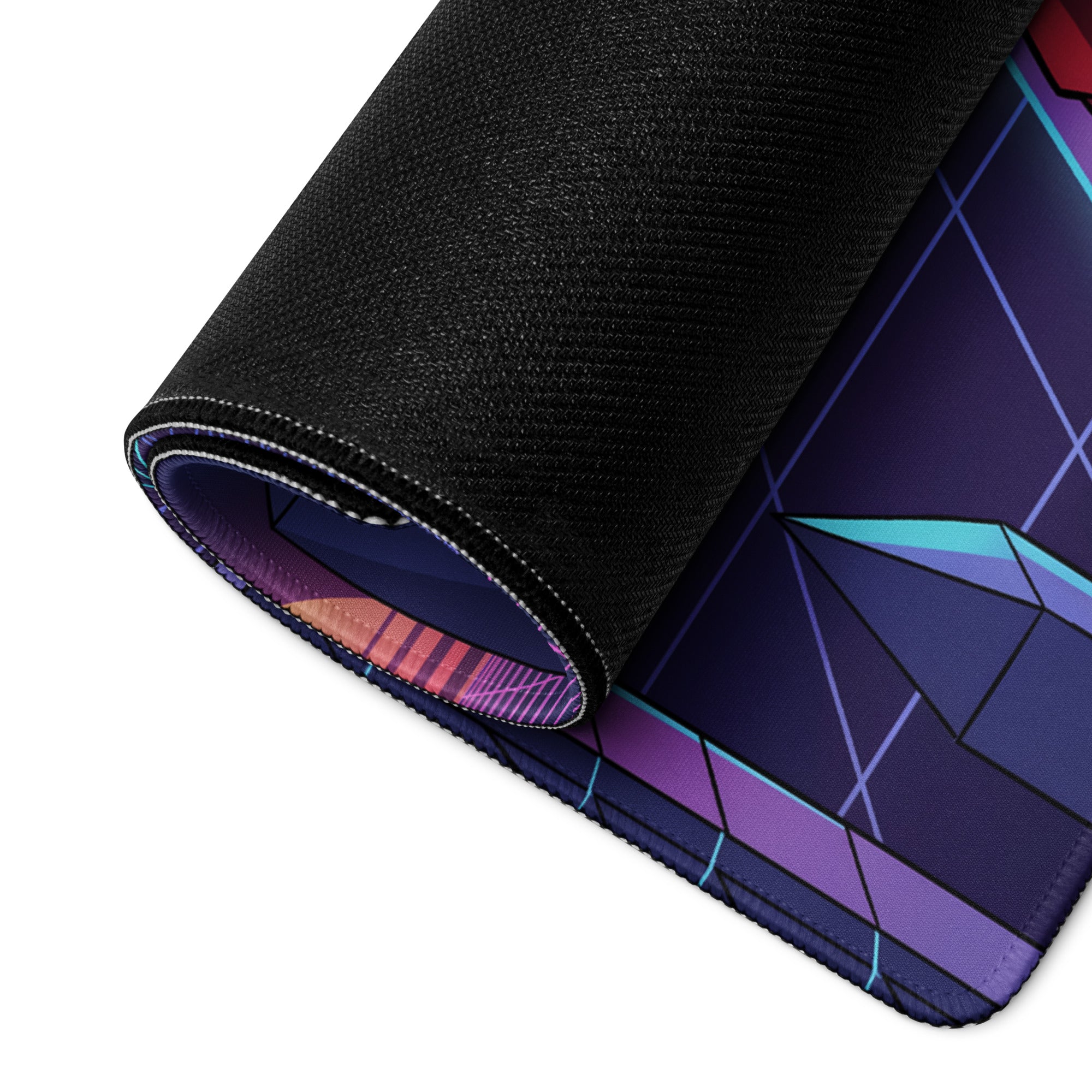 A rolled-up neon vaporwave cityscape gaming mousepad with black textured surface and vibrant purple blue teal patterns