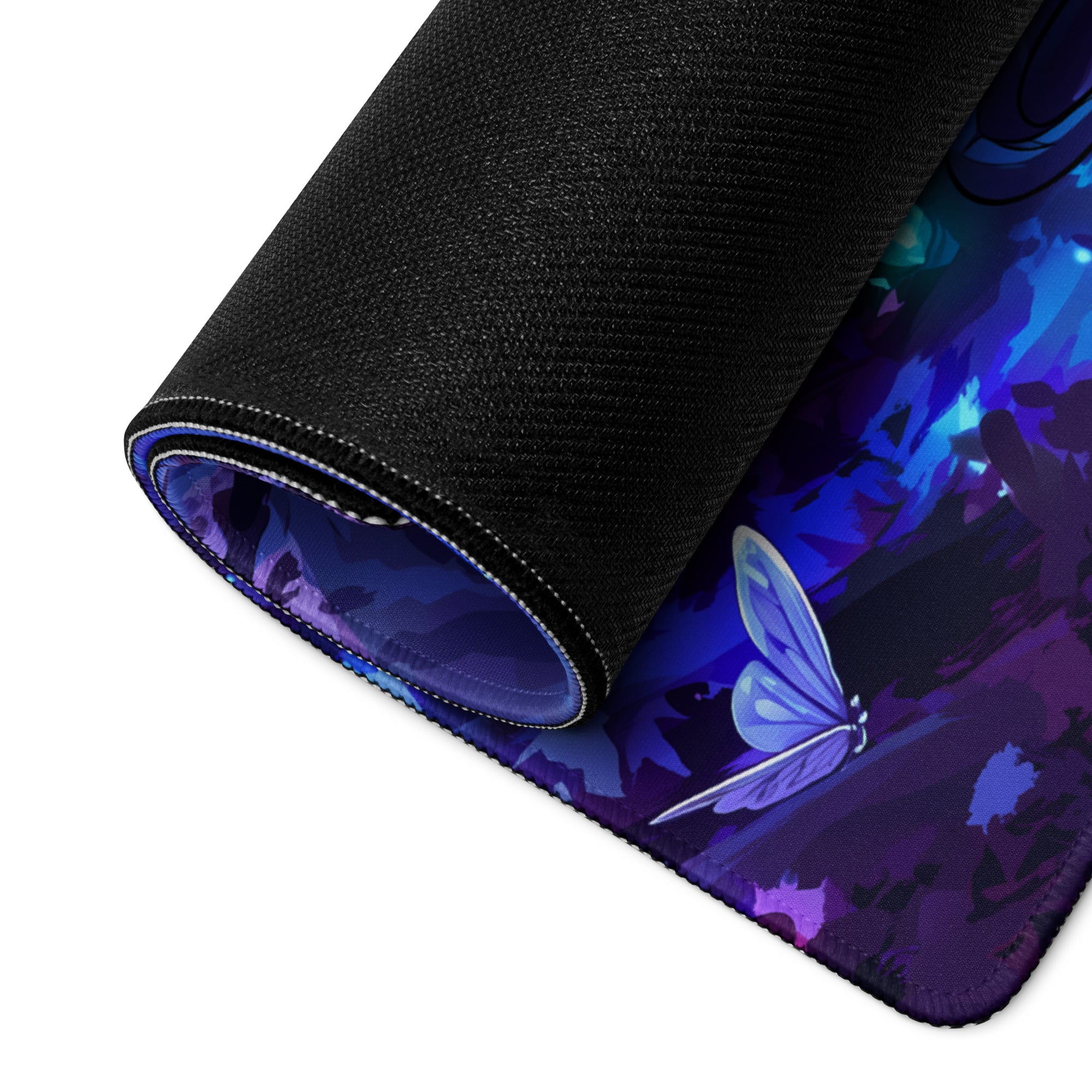 A rolled-up black neoprene mouse pad with a vibrant purple blue neon butterfly design for gaming and desk use