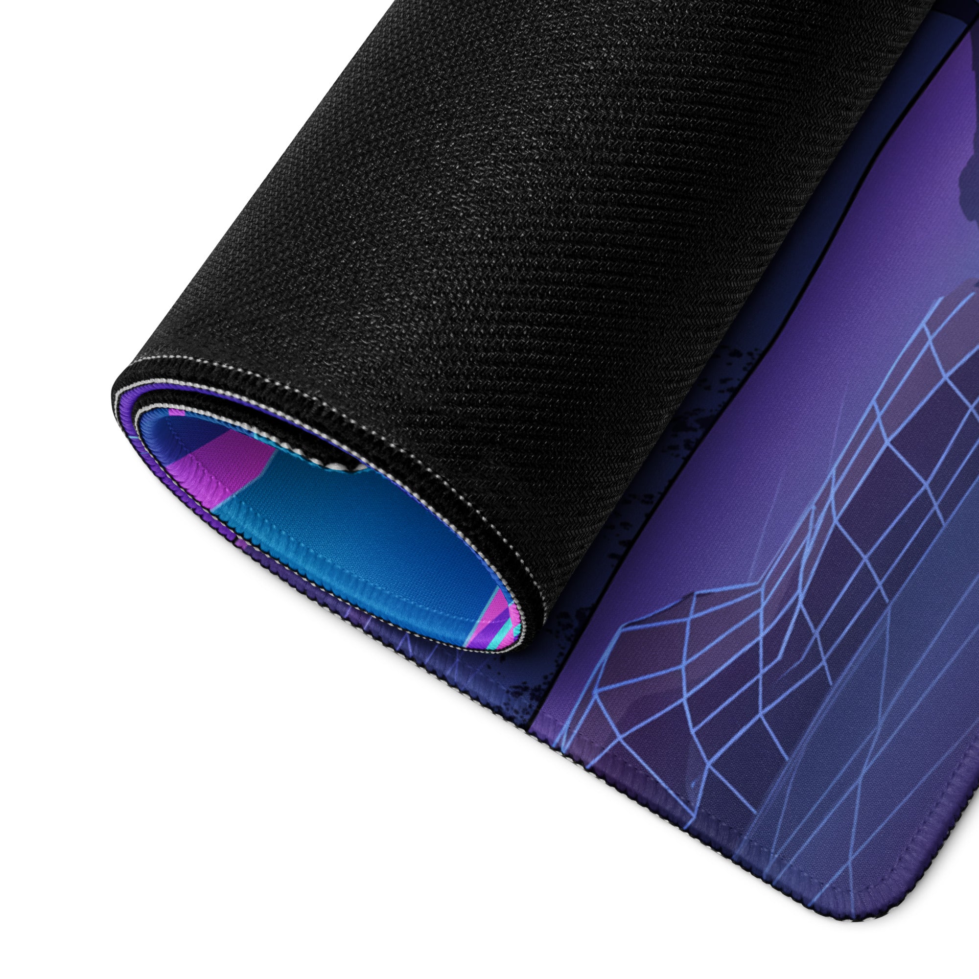 A rolled-up black gaming mousepad with a neon pink blue vaporwave gradient and textured surface for desk use