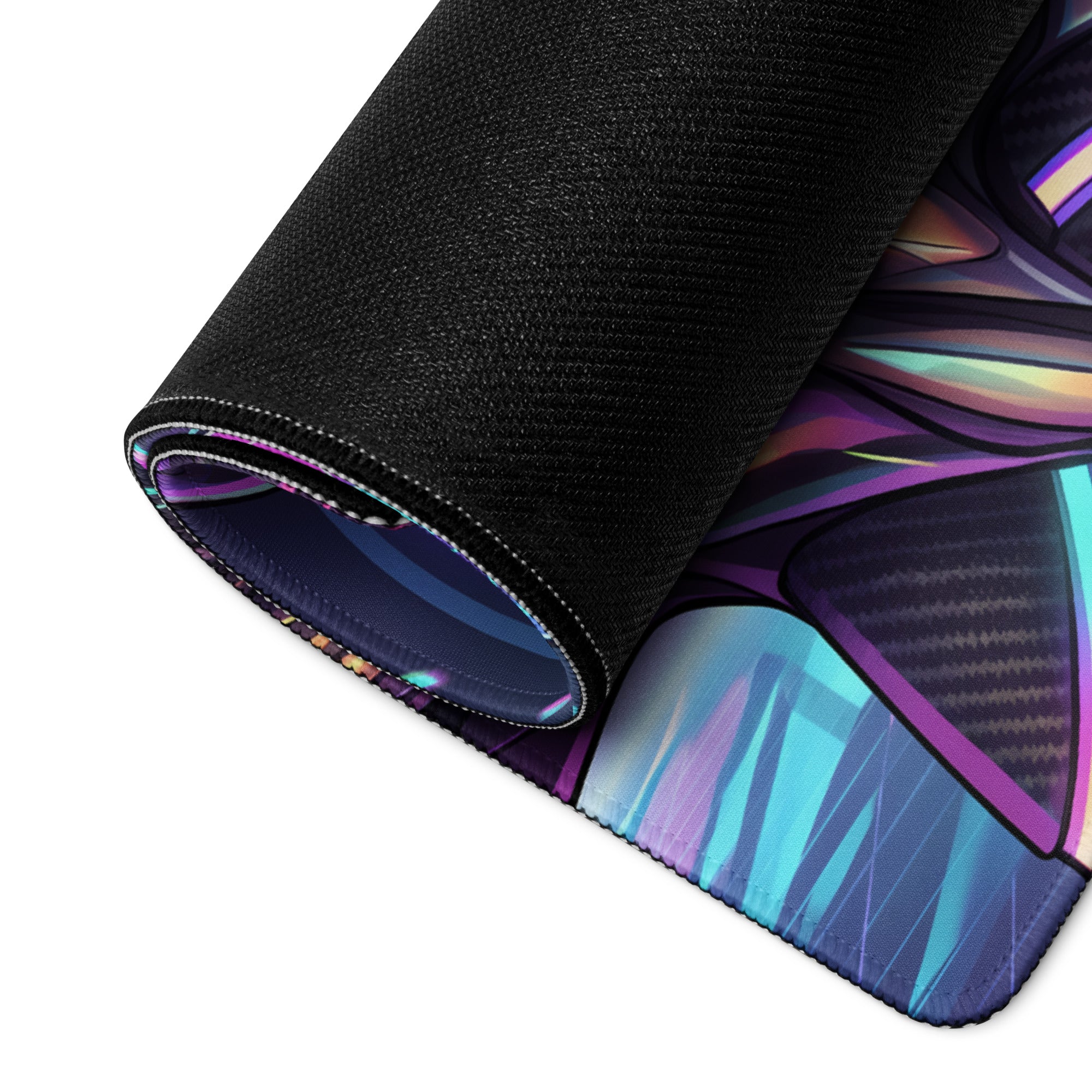 A rolled-up black gaming mousepad with a vibrant purple and teal vaporwave neon goddess design in cyberpunk style