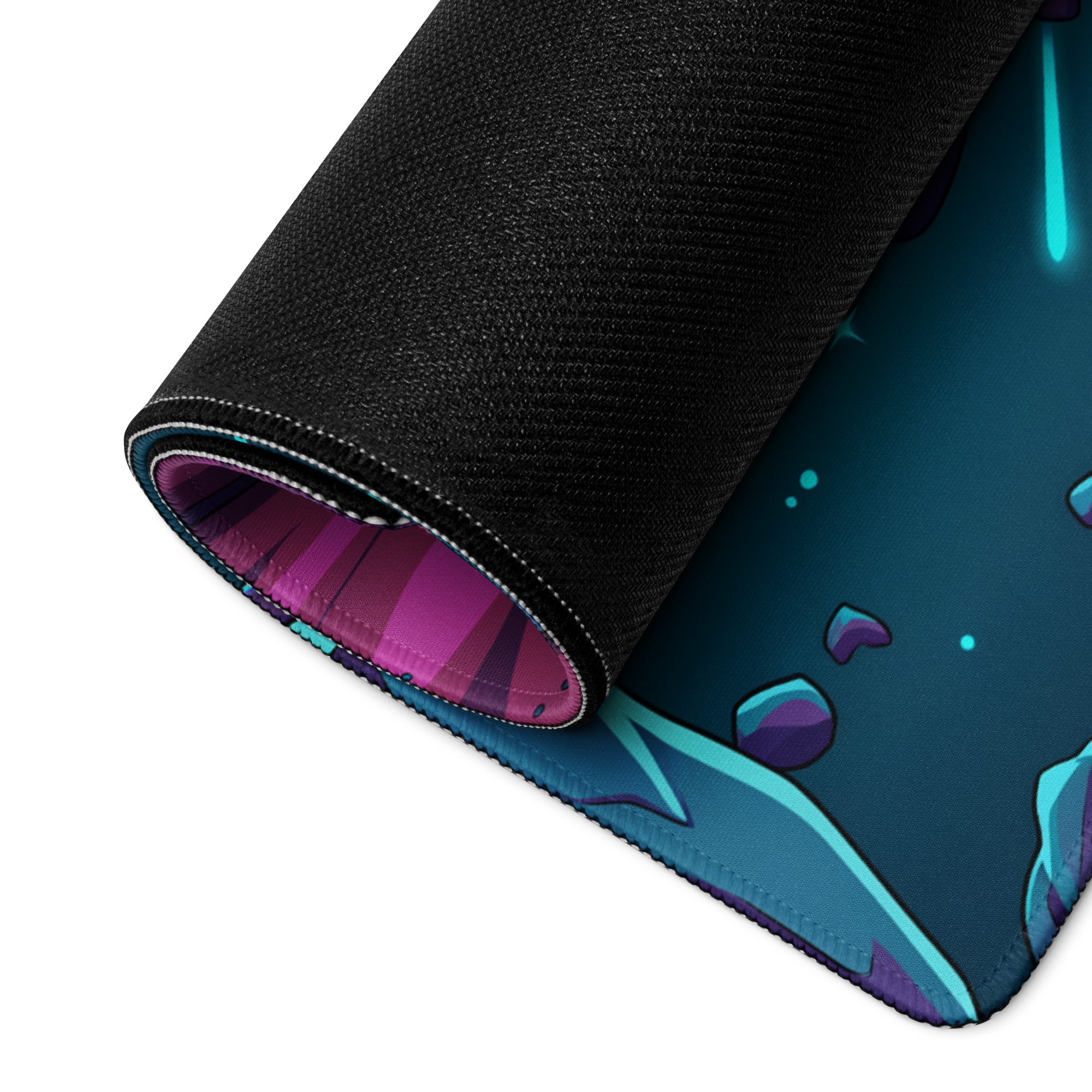 A rolled-up gaming mousepad with black textured outer surface and vibrant purple cosmic teal and blue inner lining