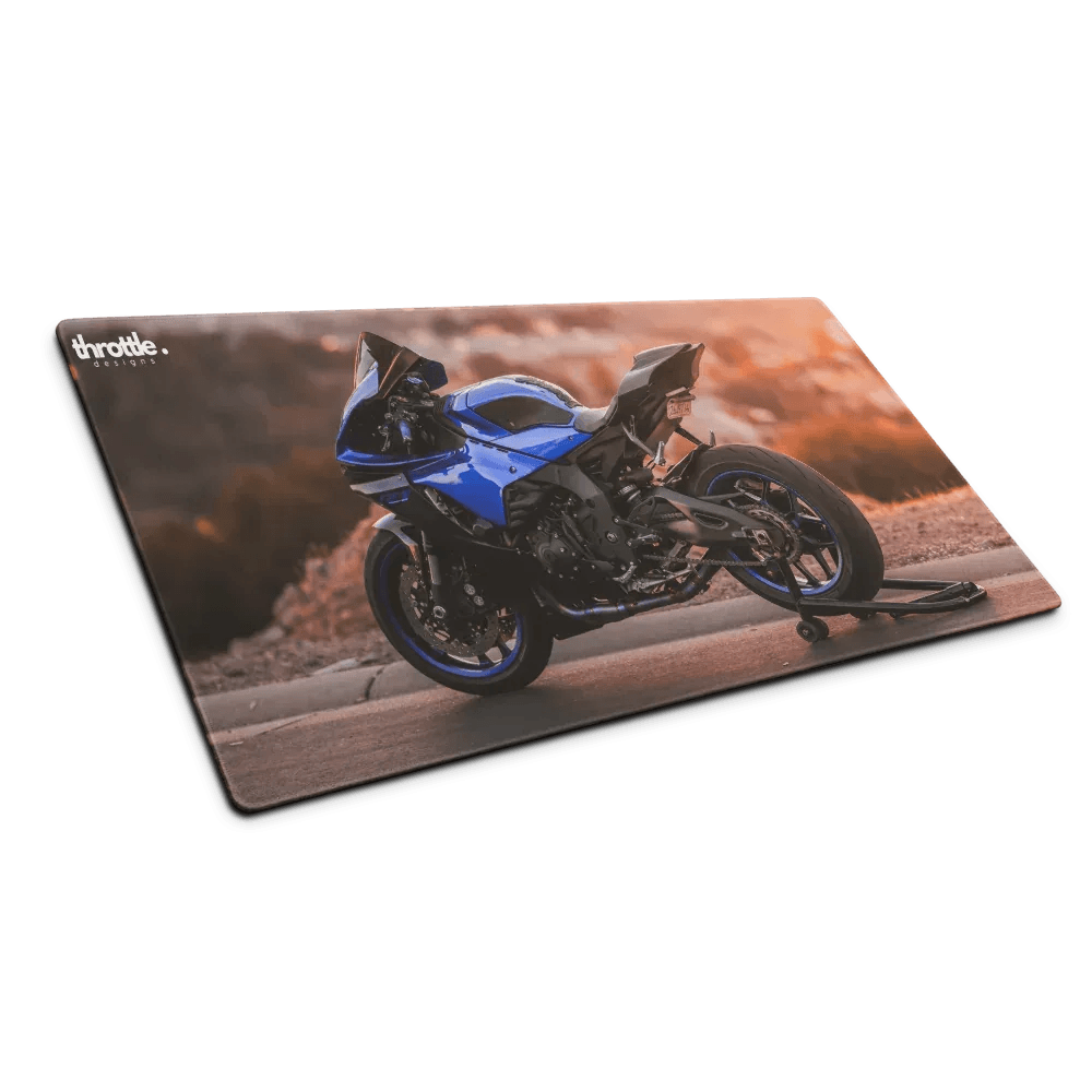 Blue and black yamaha r1 motorcycle printed on a large gaming mouse pad for extended use