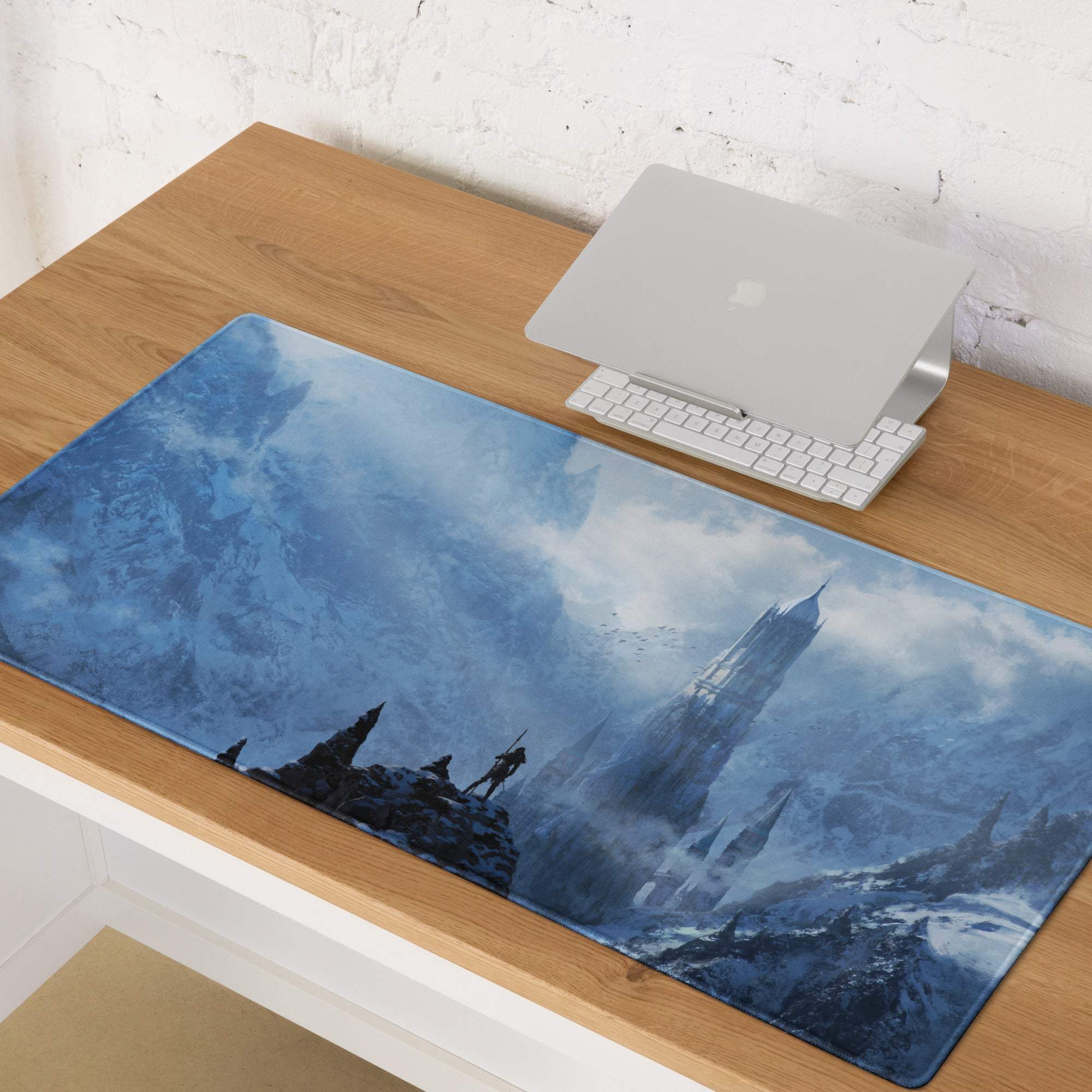 Blue ice fantasy castle gaming mouse pad with towering castle and lone figures against stormy skies in digital art style