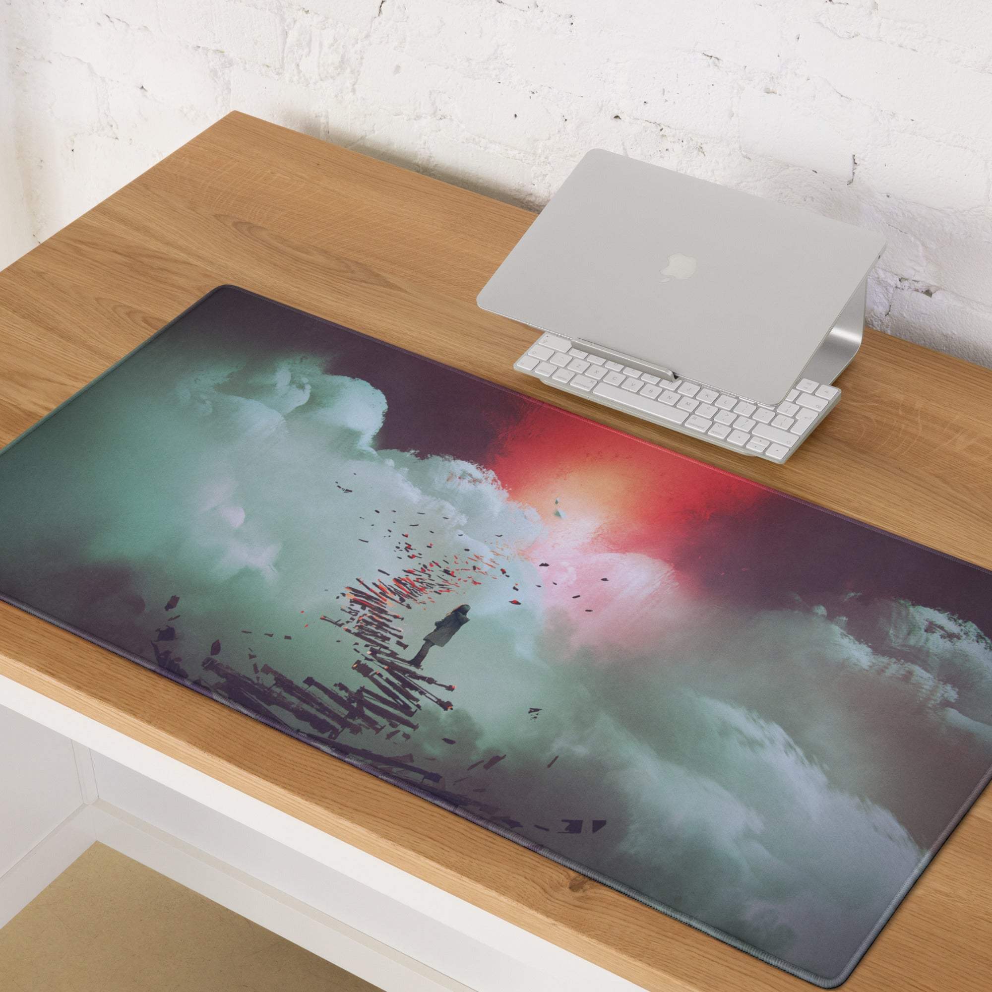 Nebula teal pink purple gaming mousepad with artistic teal and red swirling clouds and a lone figure on broken structures