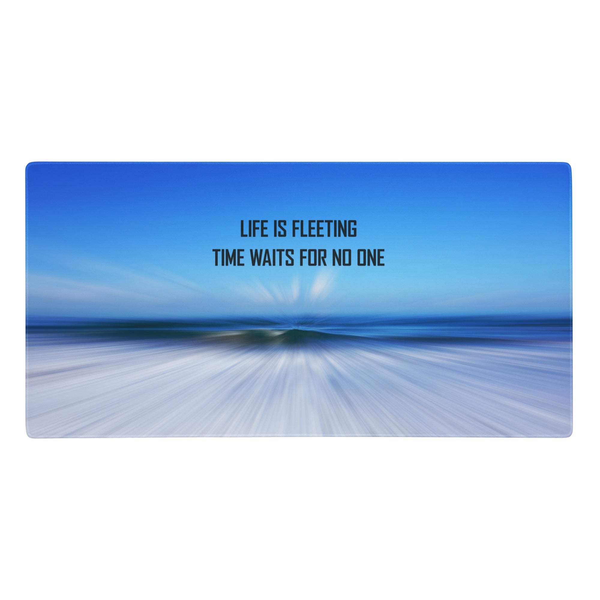 Blue gradient desk pad with beach scene and motivational black text for modern inspiring office use