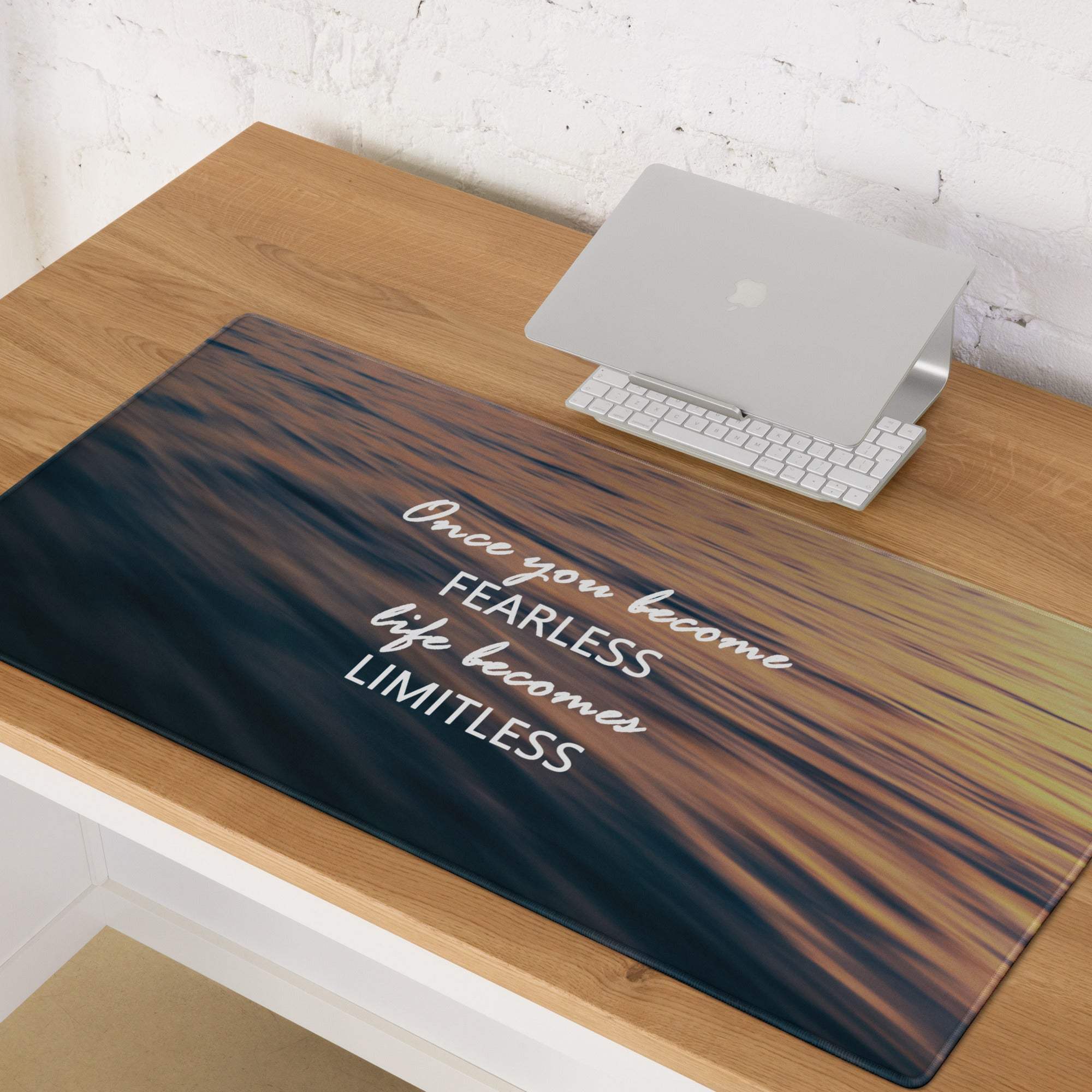 Blue orange sunset motivational desk pad mouse pad with dark wood grain texture and white cursive inspirational quote