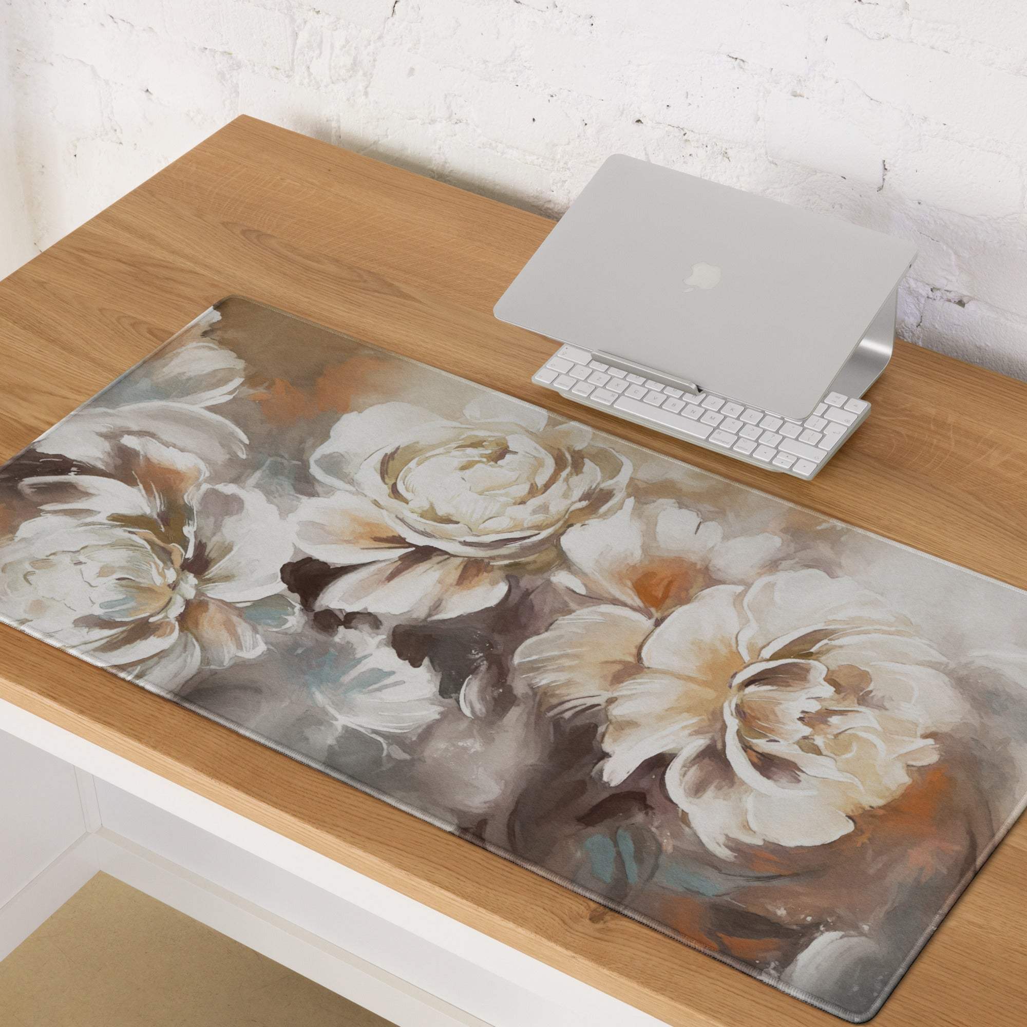 A rectangular soft-touch floral rose desk pad with large white and cream roses in peach ivory for home office decor