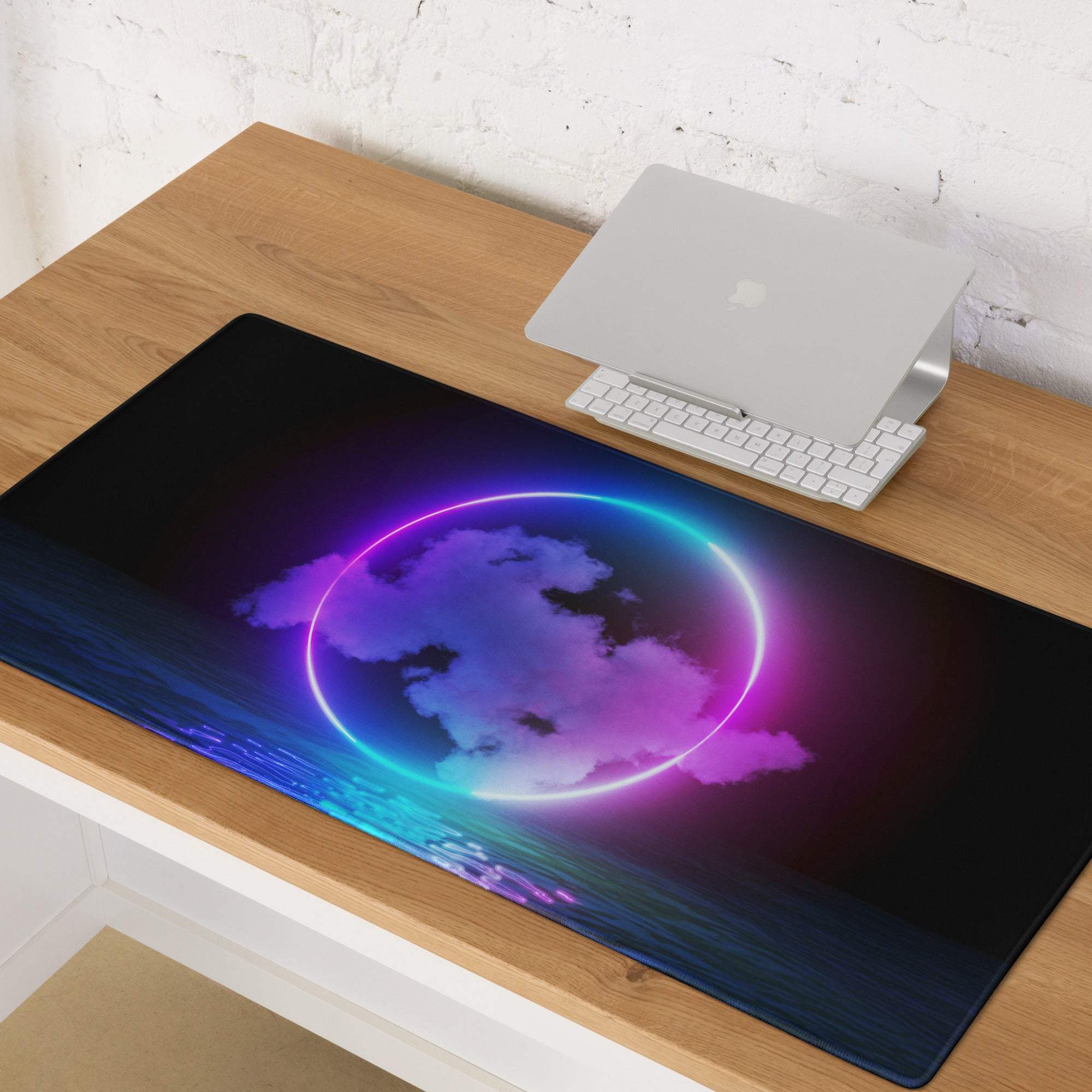 A sleek black gaming mousepad with a neon purple and blue ring featuring stylized clouds over water